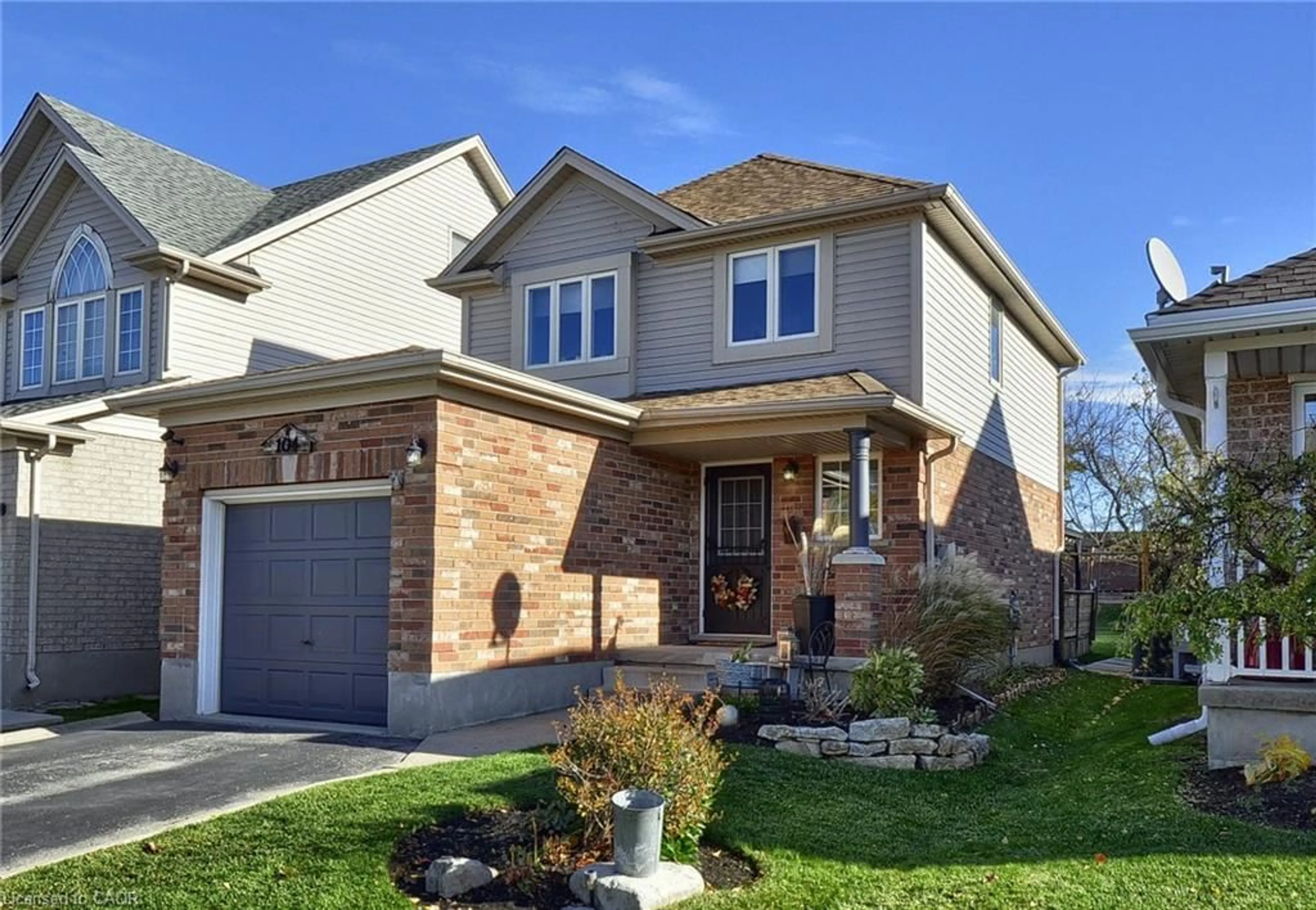 Home with brick exterior material, street for 104 Livingstone Cres, Cambridge Ontario N3H 5S8