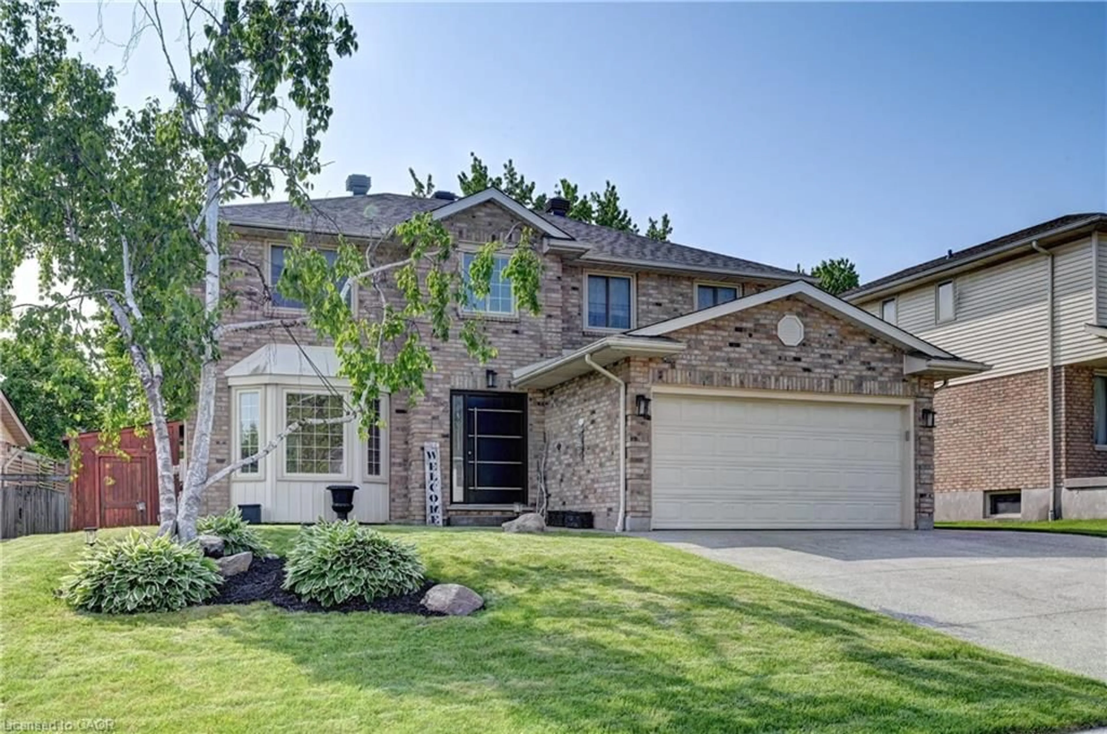 Home with brick exterior material, street for 352 Stephanie Dr, Guelph Ontario N1K 1R3