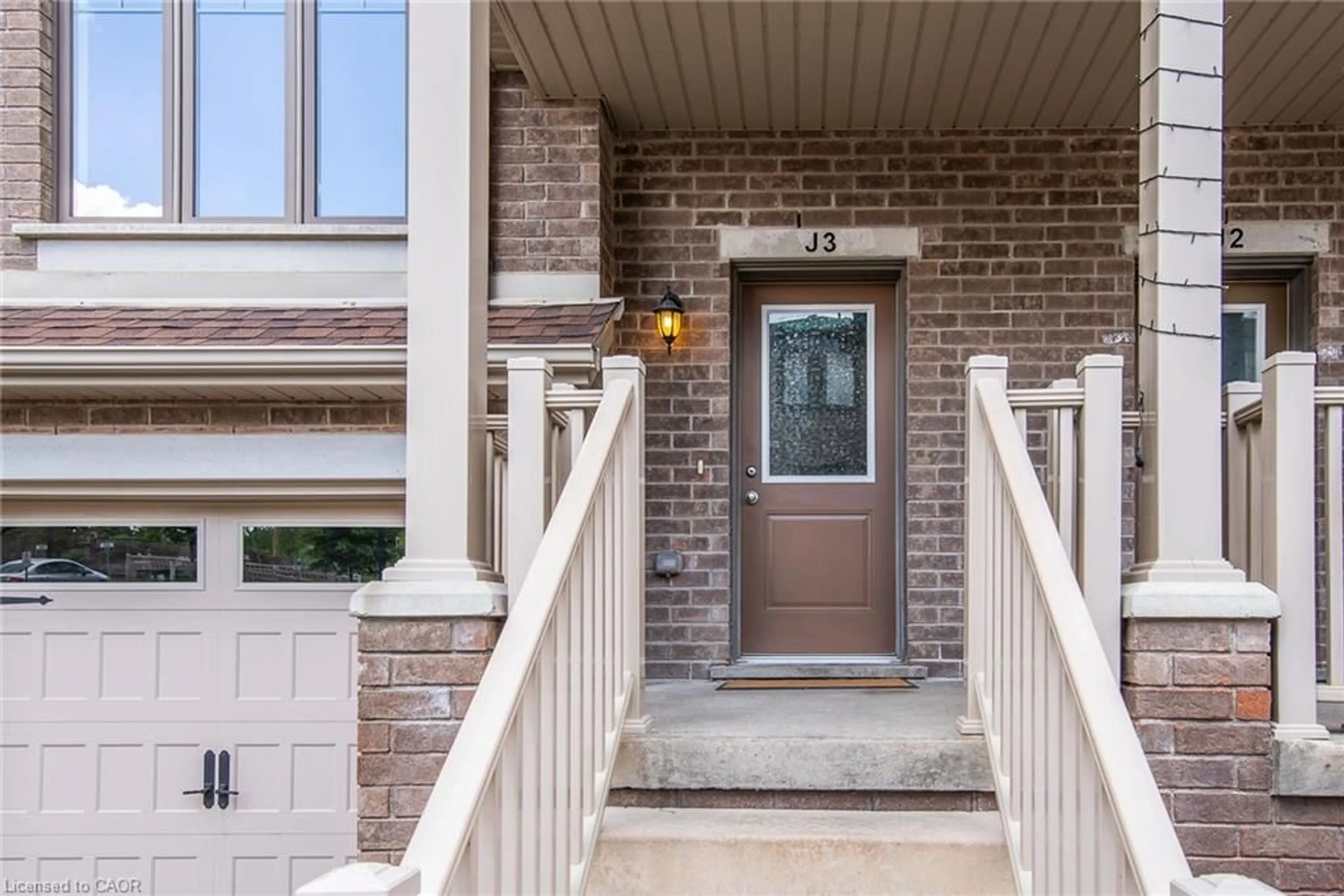 Home with brick exterior material, street for 70 Willowrun Dr #J-3, Kitchener Ontario N2A 0J3