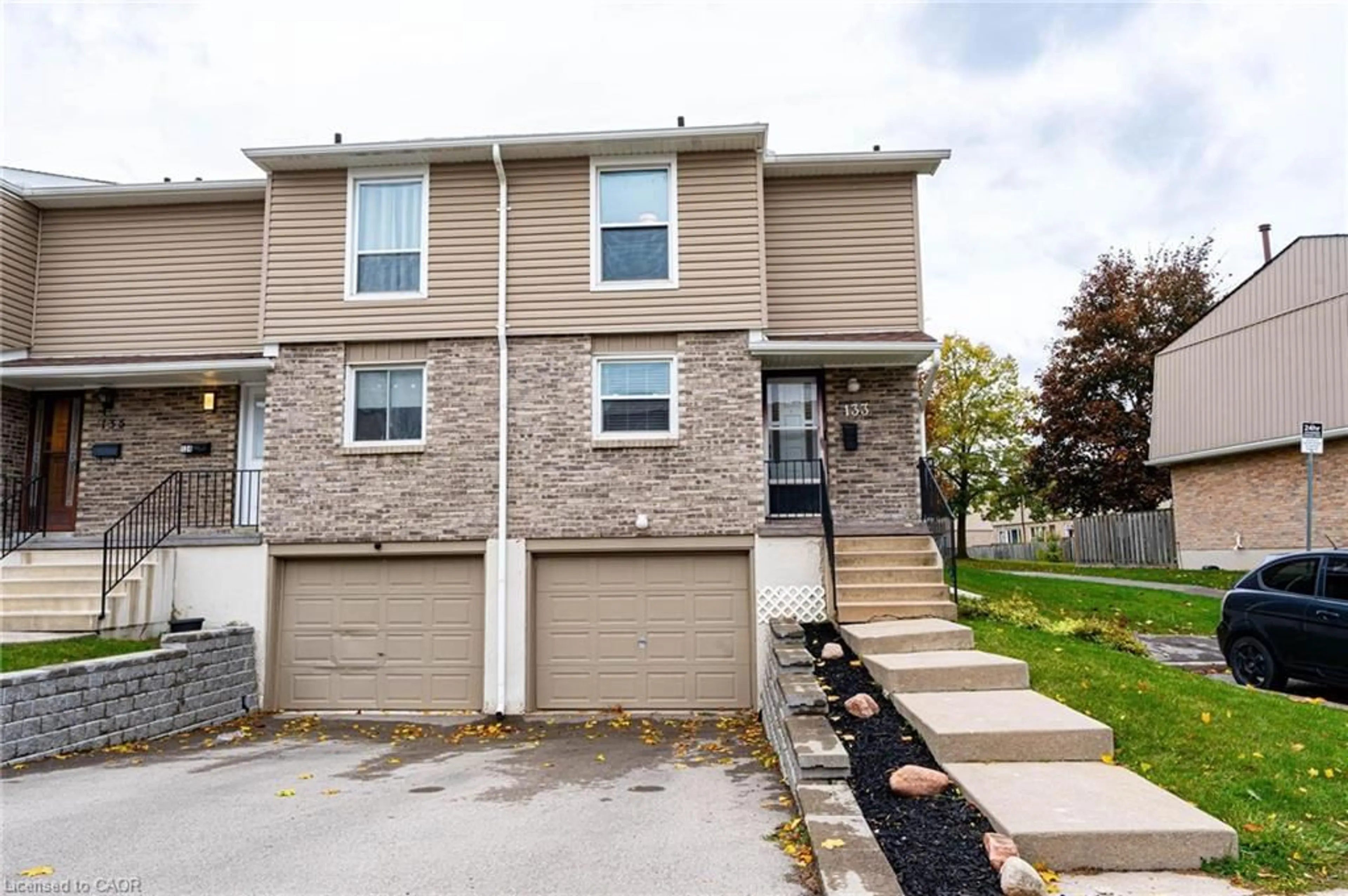 Home with vinyl exterior material, street for 10 Angus Rd #133, Hamilton Ontario L8K 6K3