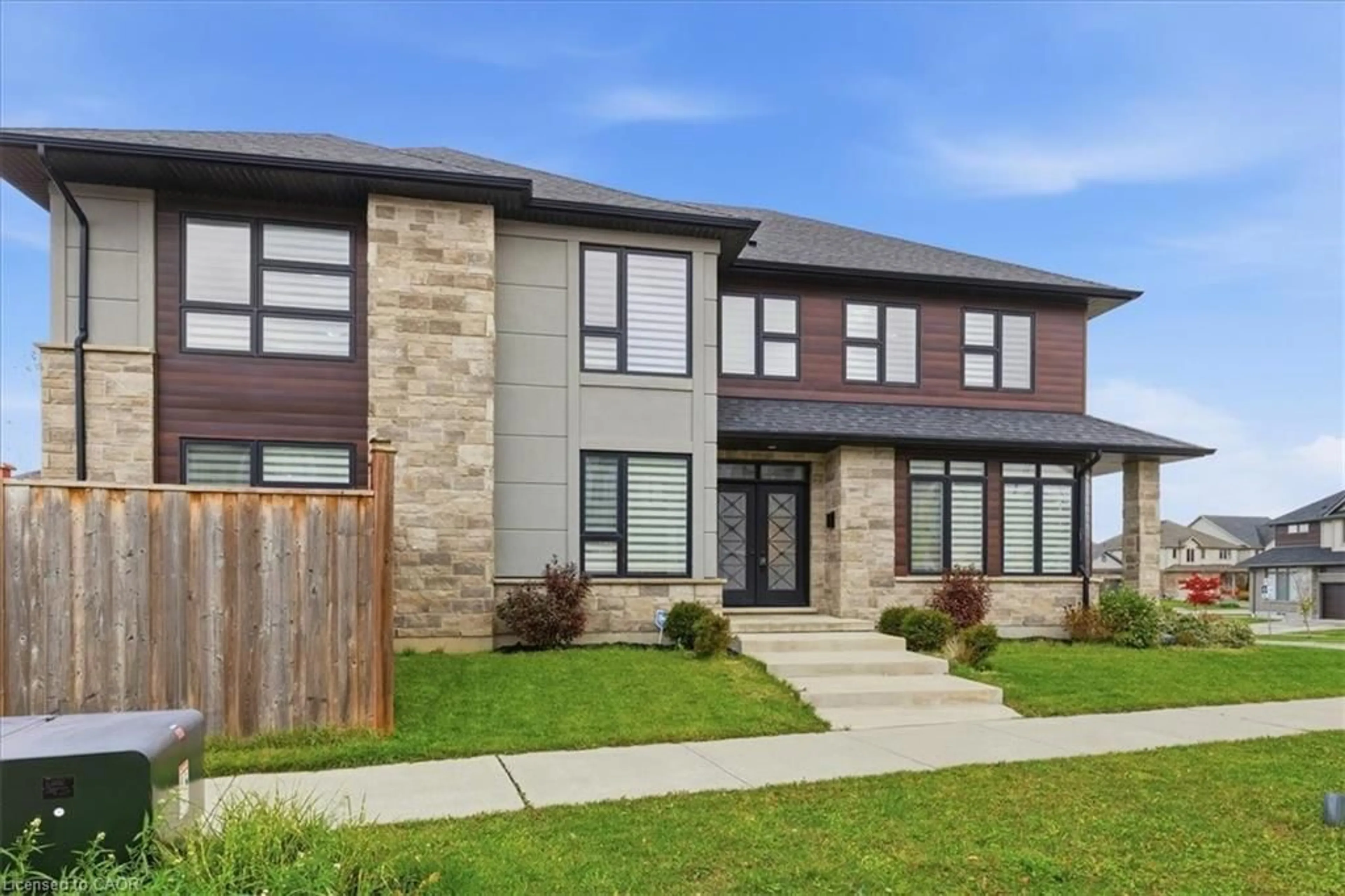 Home with brick exterior material, street for 556 Mayapple St, Waterloo Ontario N2V 0G2