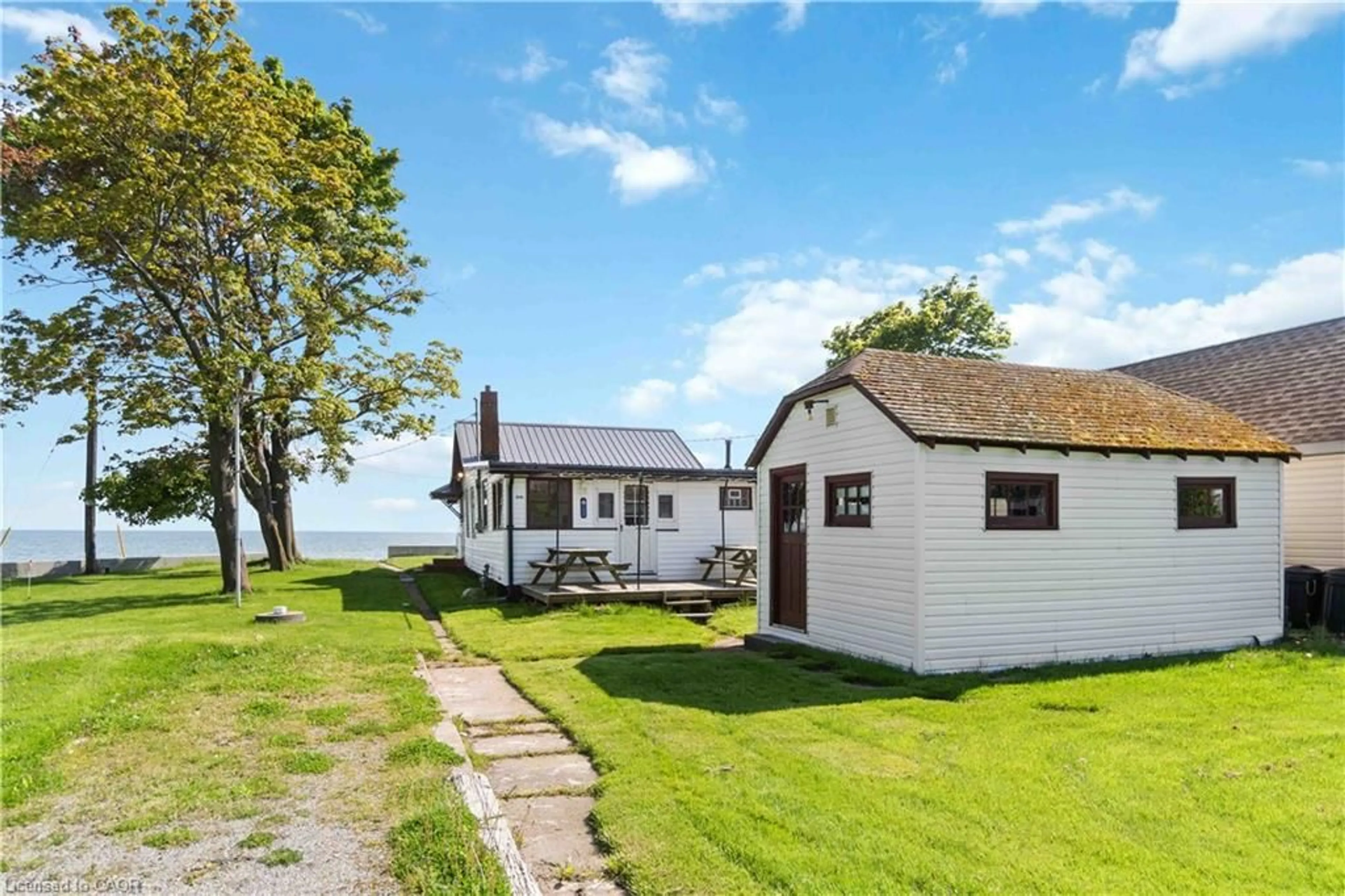 A pic from outside/outdoor area/front of a property/back of a property/a pic from drone, water/lake/river/ocean view for 10953 Lakeshore Rd, Wainfleet Ontario L3K 5V4