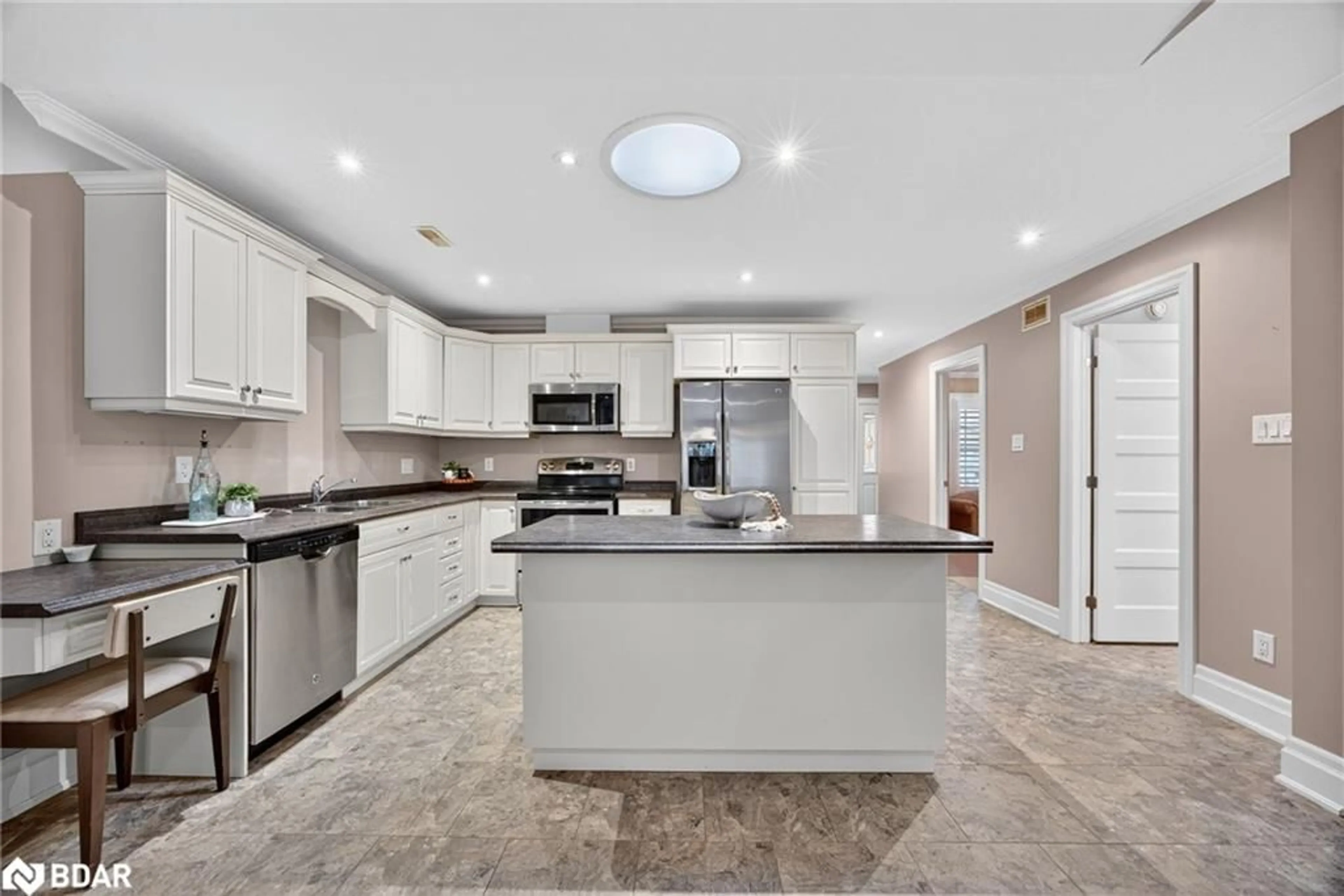 Open concept kitchen, ceramic/tile floor for 53 Clover Cres, Wasaga Beach Ontario L9Z 0G4