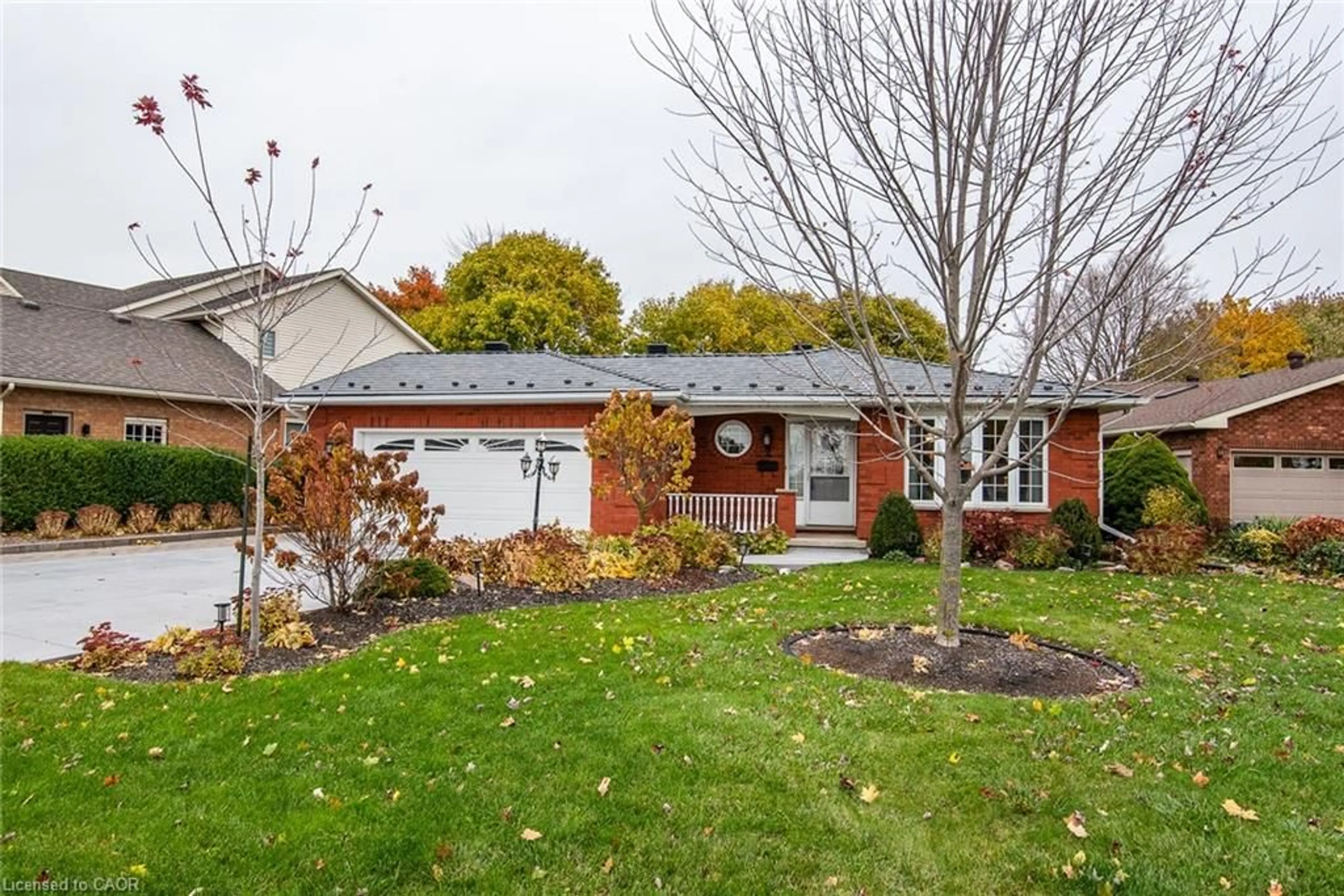 Home with brick exterior material, street for 2 Peregrine Cres, Elmira Ontario N3B 3J3