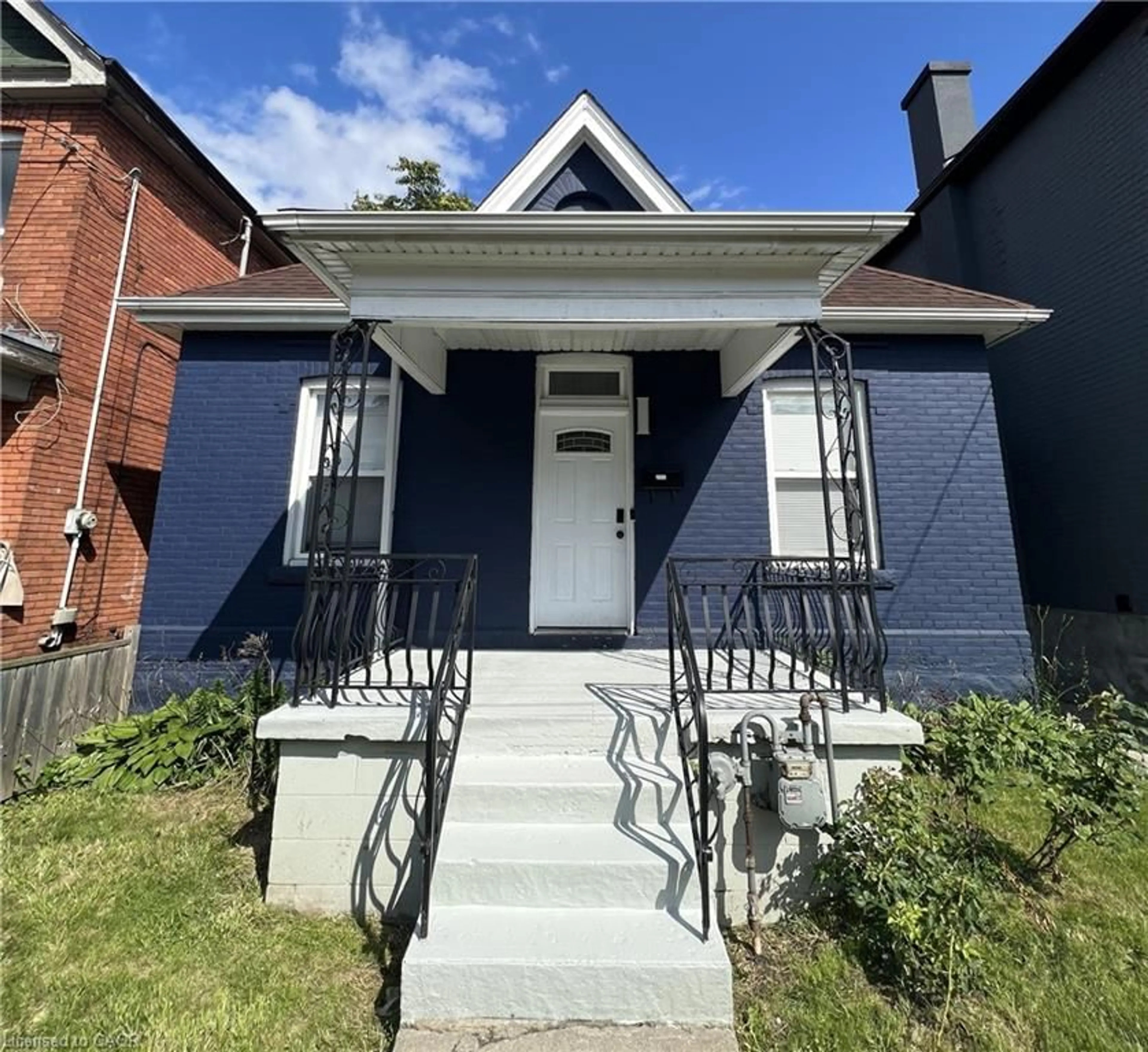 Home with brick exterior material, street for 44 Madison Ave, Hamilton Ontario L8L 5Y4