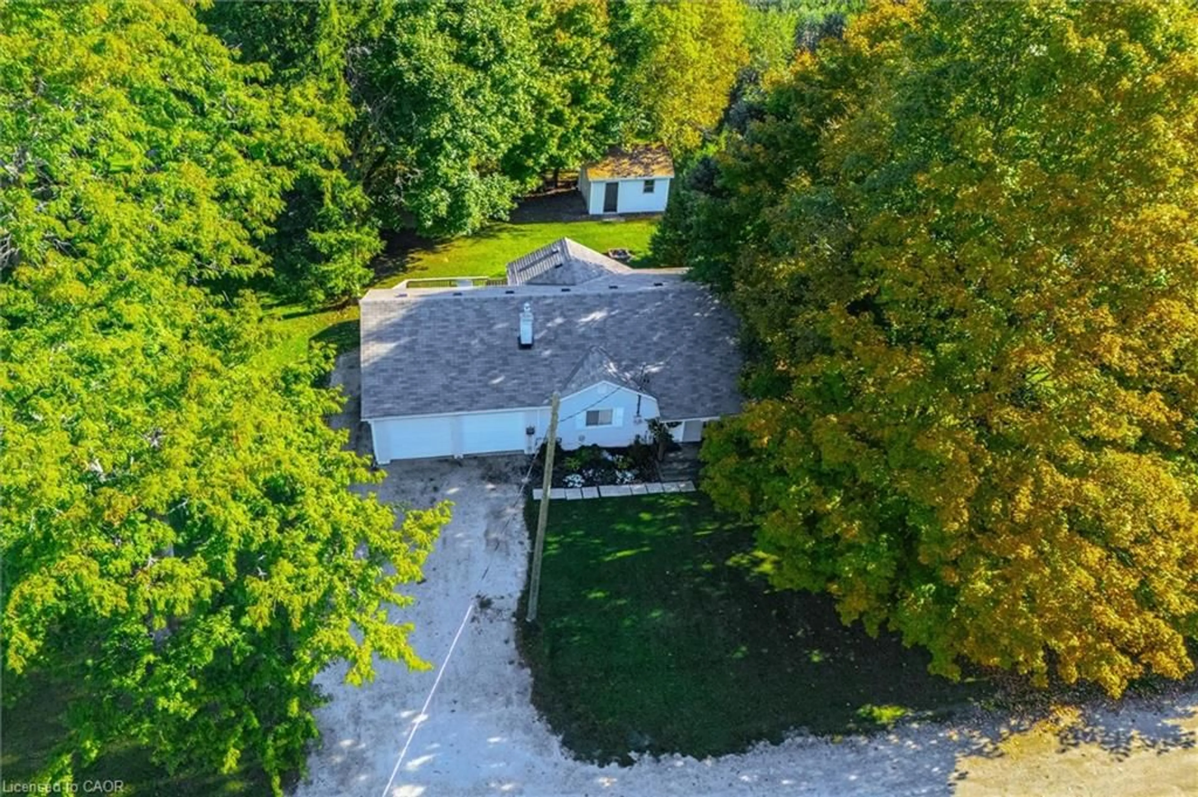 A pic from outside/outdoor area/front of a property/back of a property/a pic from drone, unknown for 7 Church St, Alma Ontario N0B 1A0