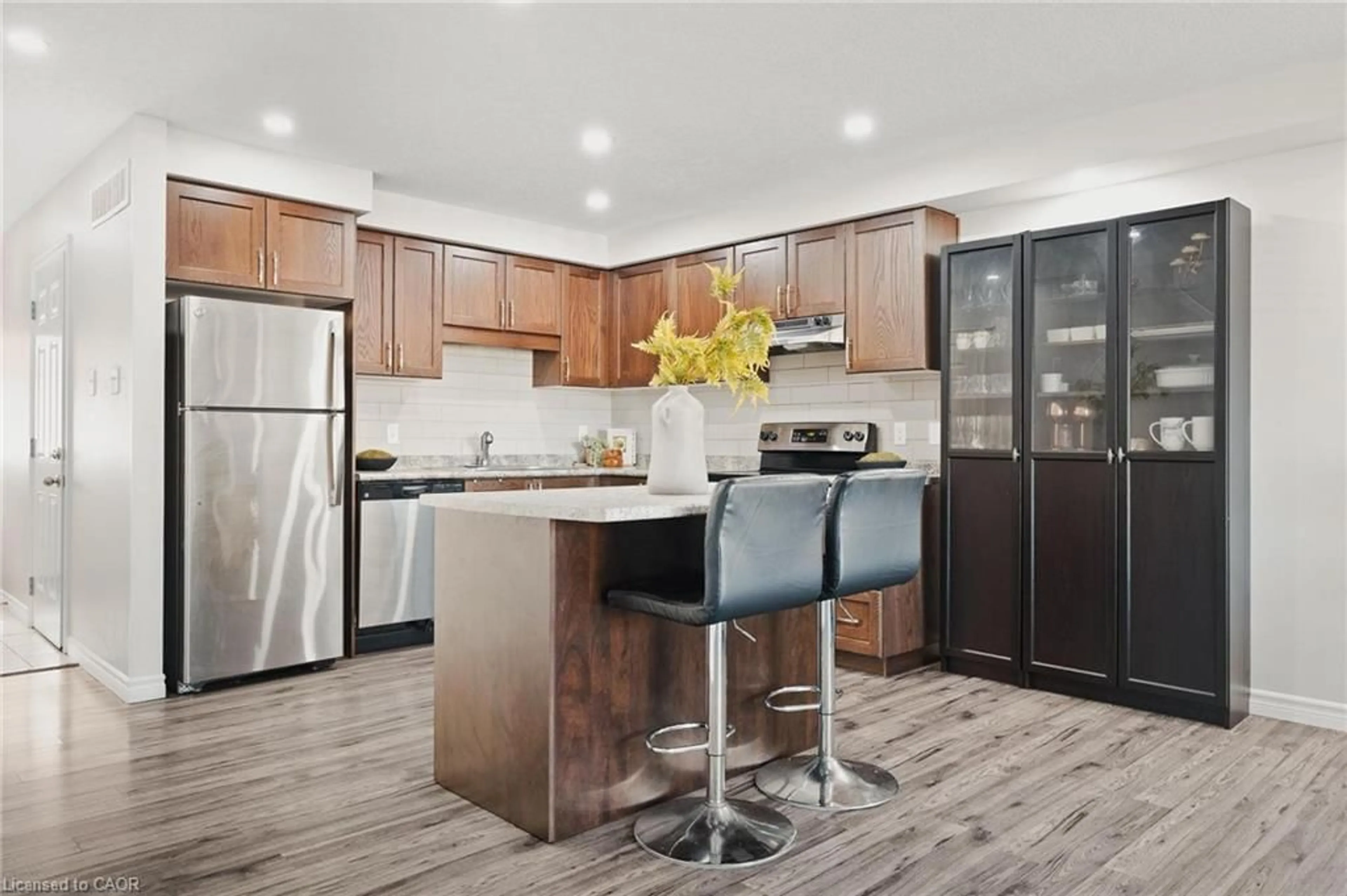 Open concept kitchen, wood/laminate floor for 1989 Ottawa St #47, Kitchener Ontario N2E 0G7