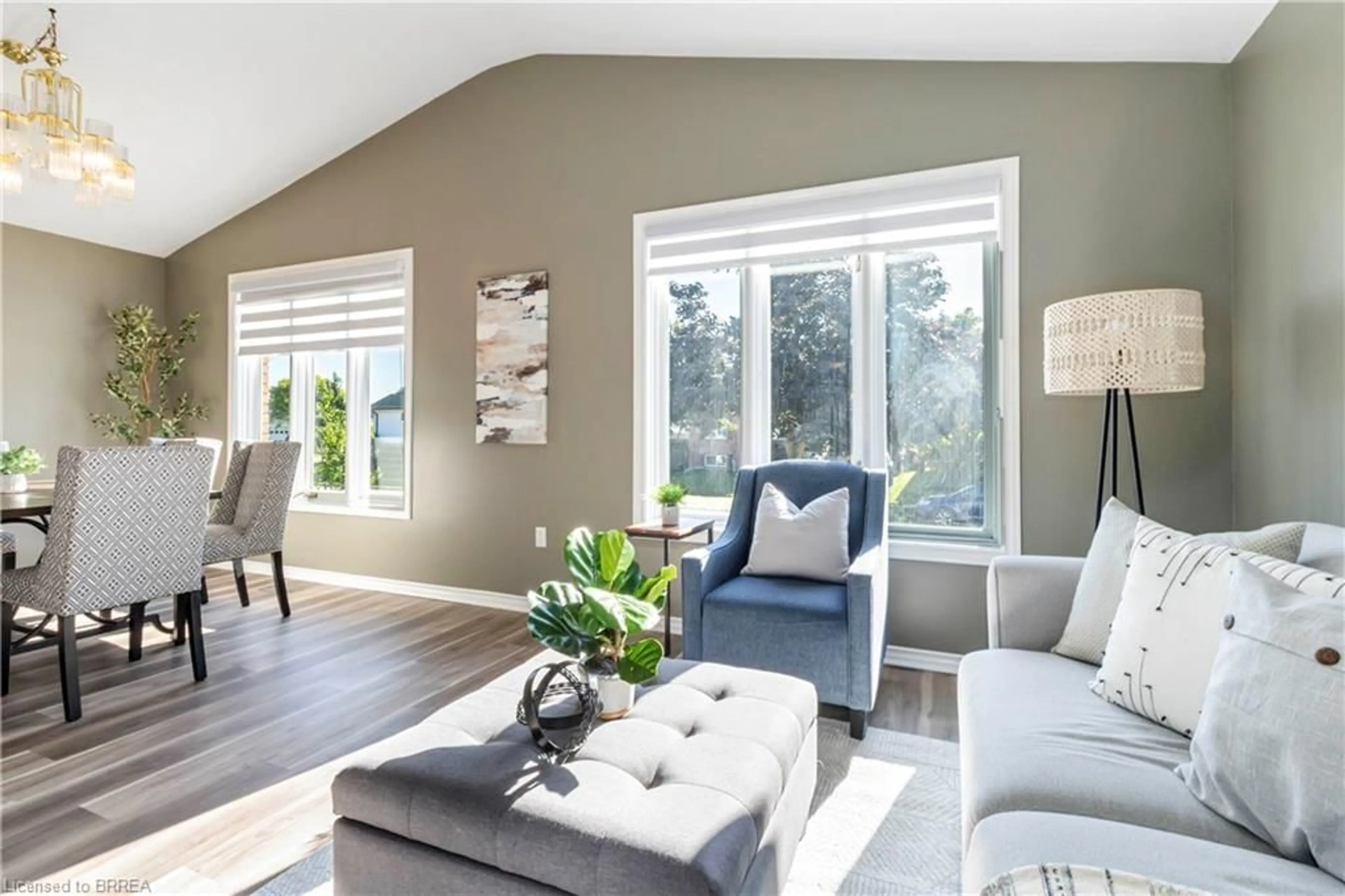 Living room with furniture, wood/laminate floor for 5 Cork Cres, Brantford Ontario N3V 1E3