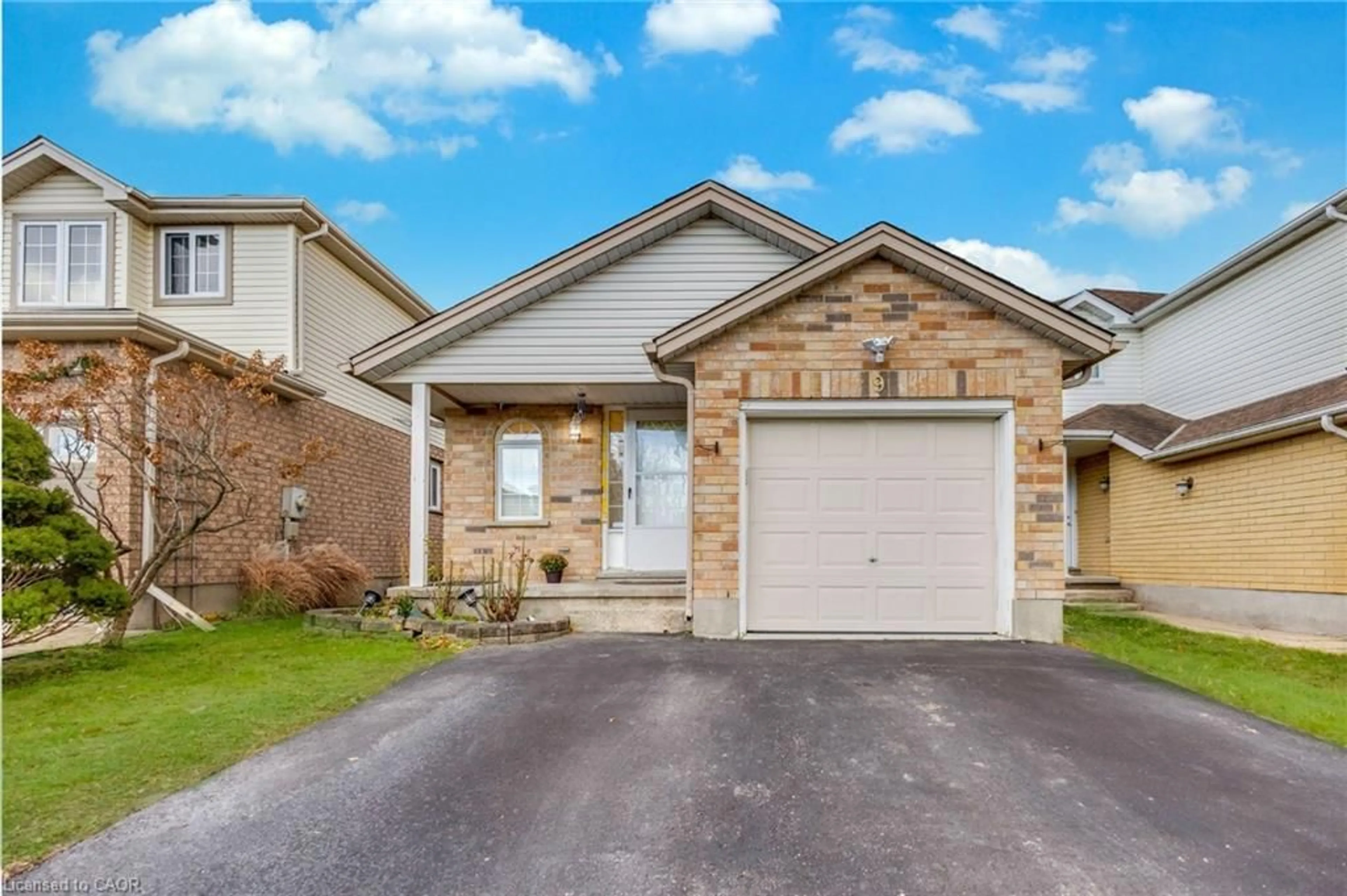 Home with brick exterior material, street for 9 Bush Clover Cres, Kitchener Ontario N2E 3P9