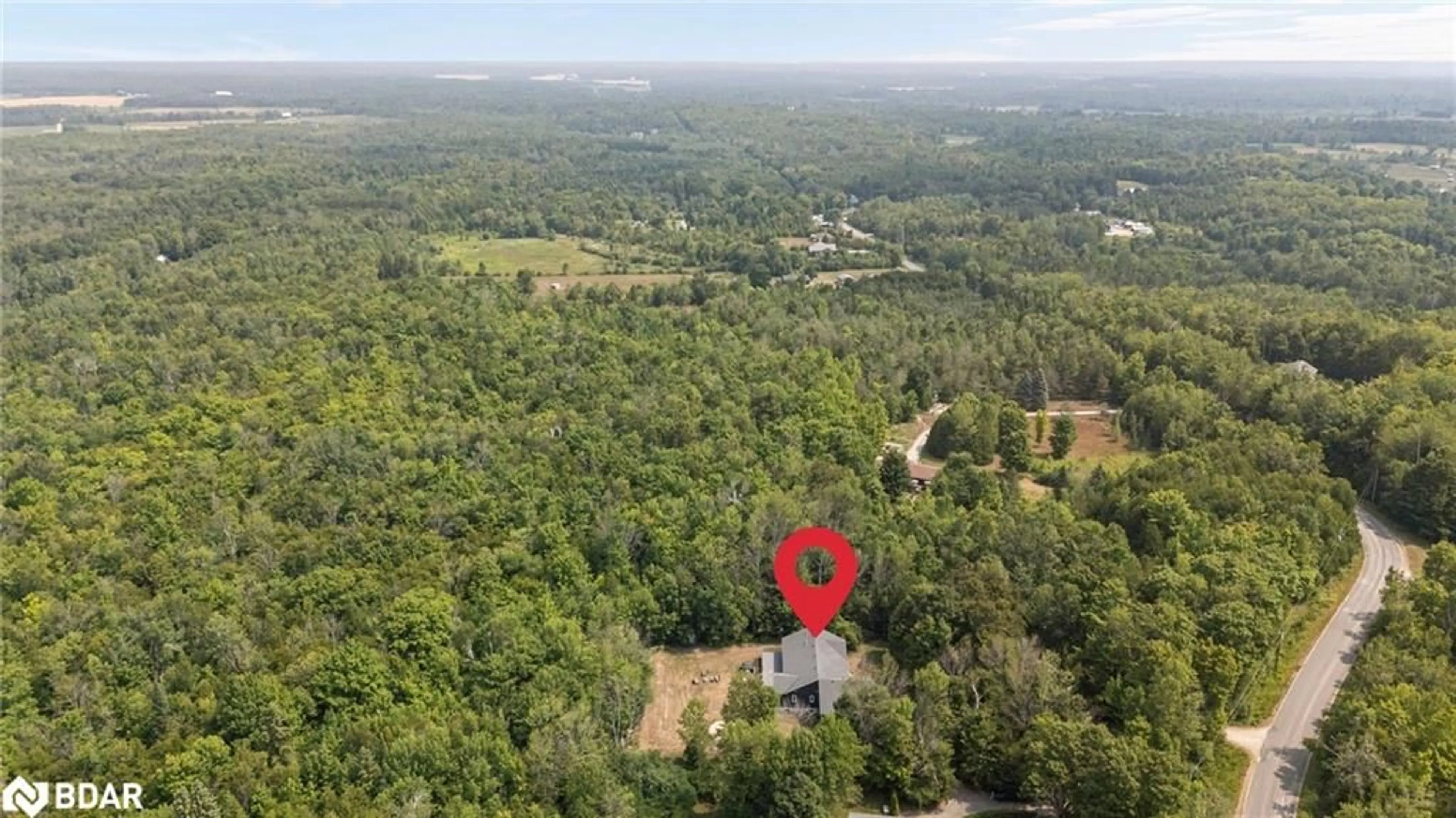A pic from outside/outdoor area/front of a property/back of a property/a pic from drone, forest/trees view for 2326 Foxmead Road Rd, Coldwater Ontario L0K 1E0