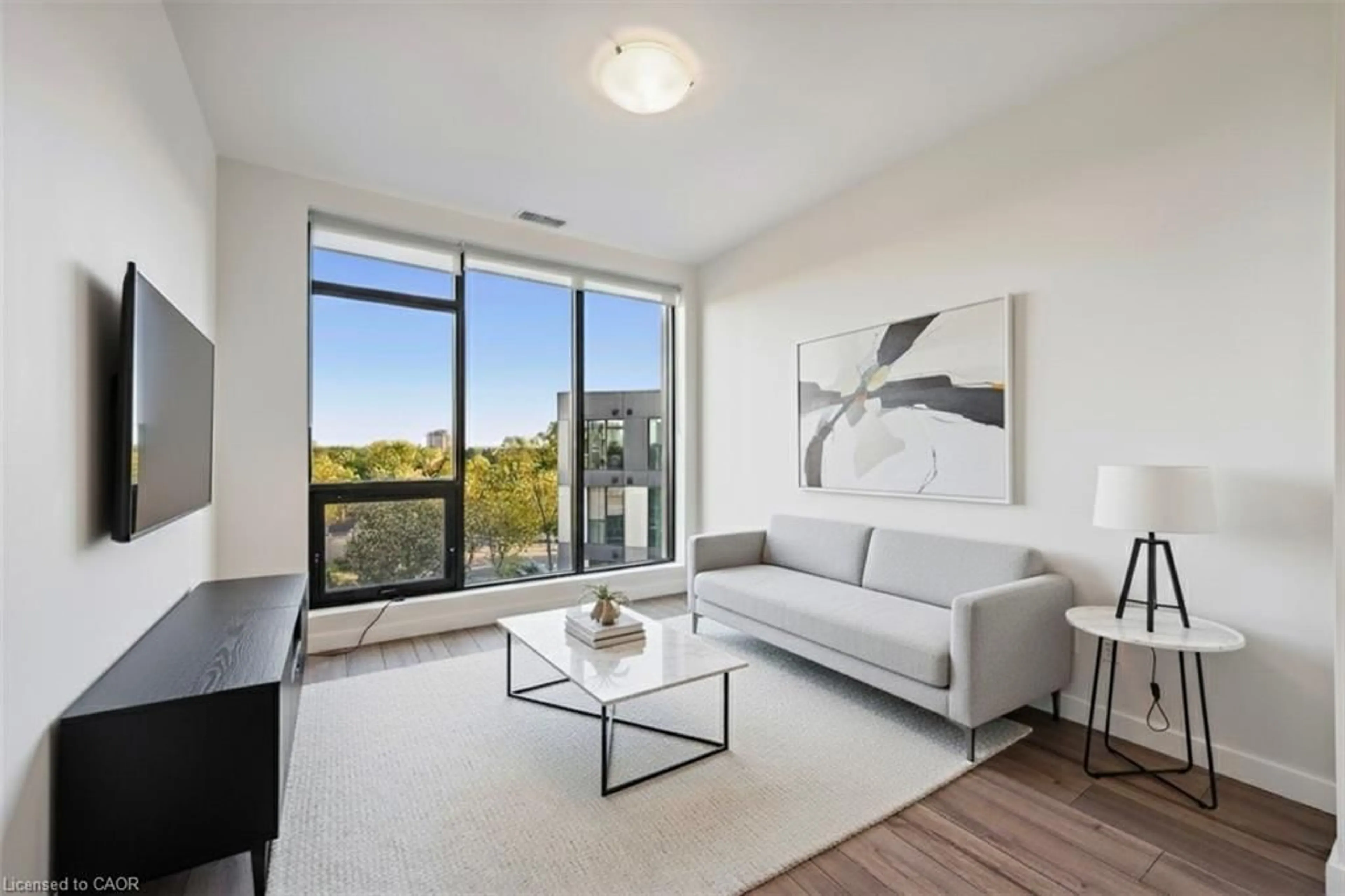 Living room with furniture, unknown for 690 King St #622, Kitchener Ontario N2H 5L8