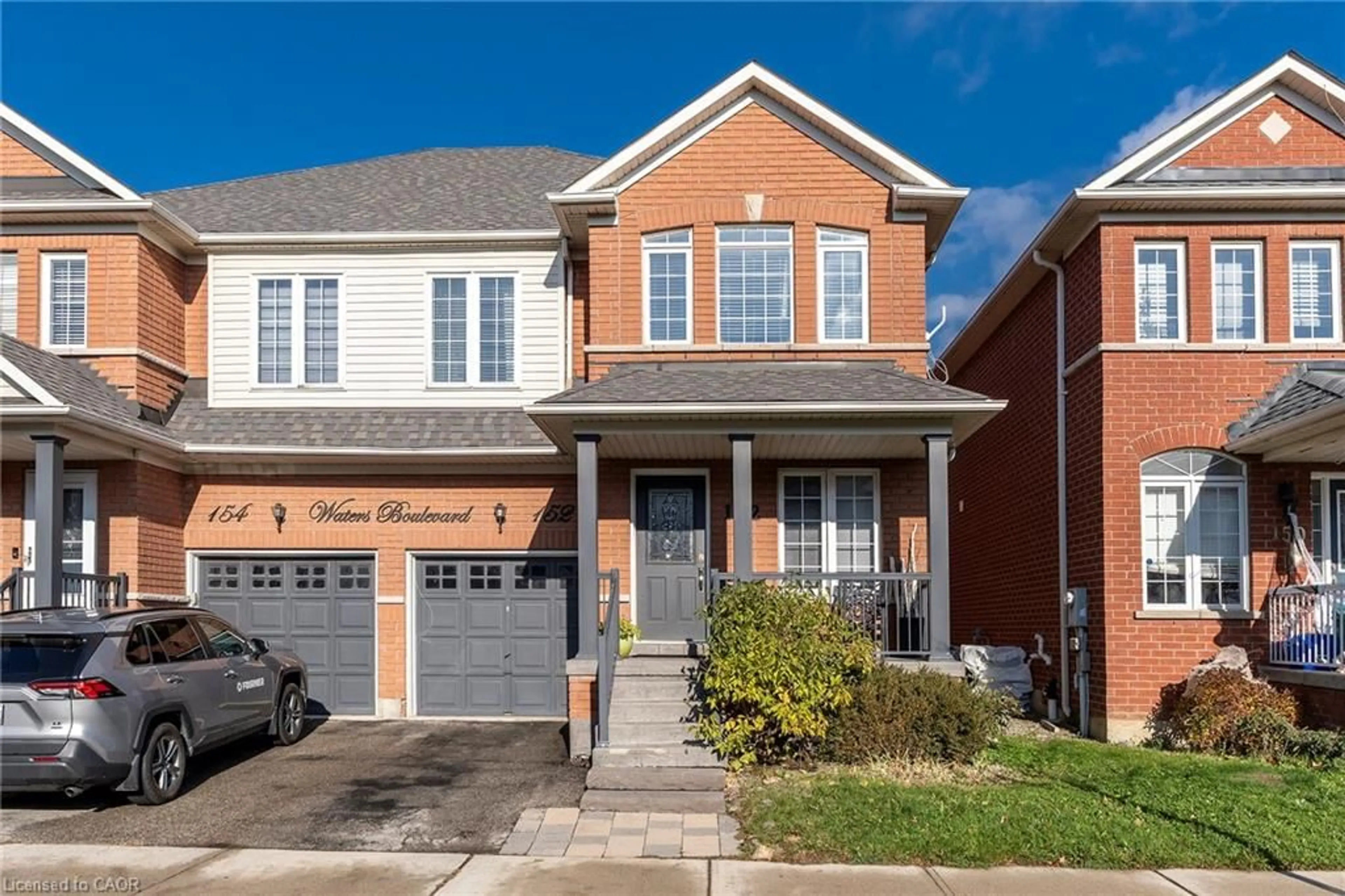 Home with brick exterior material, street for 152 Waters Blvd, Milton Ontario L9T 6K5