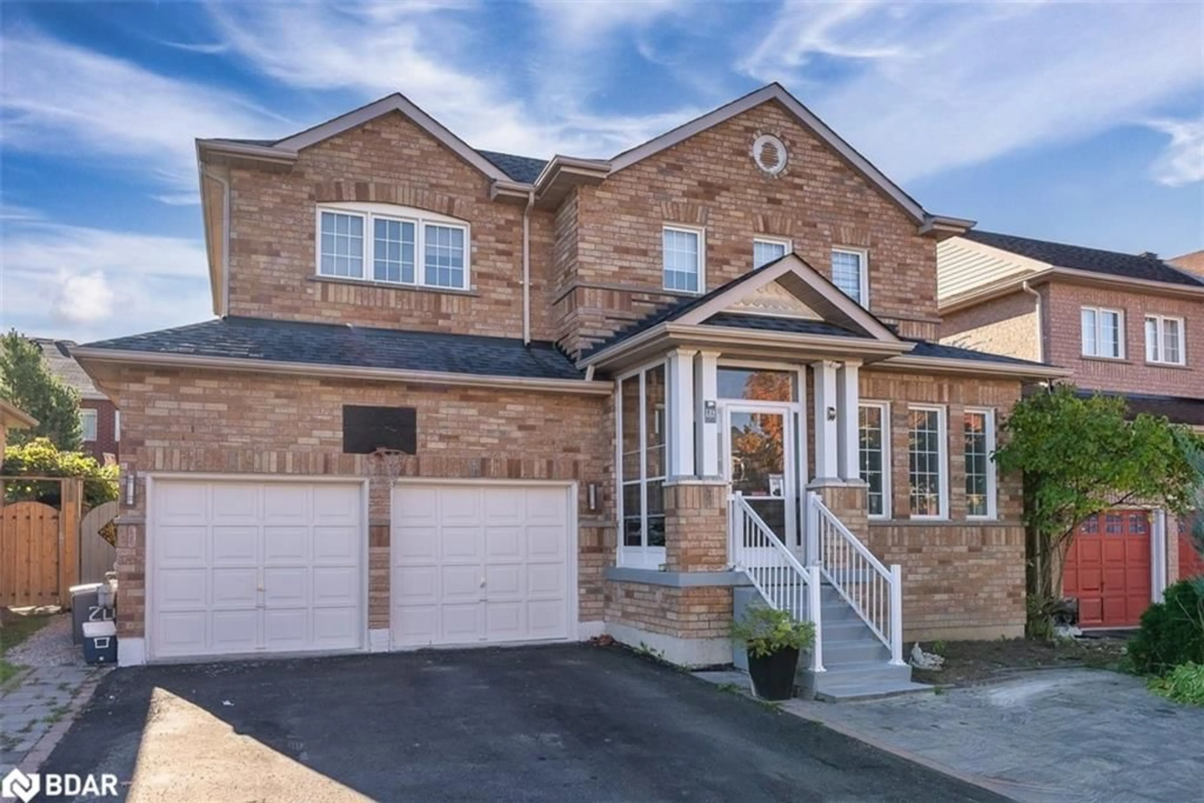 Home with brick exterior material, street for 129 Flagstone Way, Newmarket Ontario L3X 2Z8