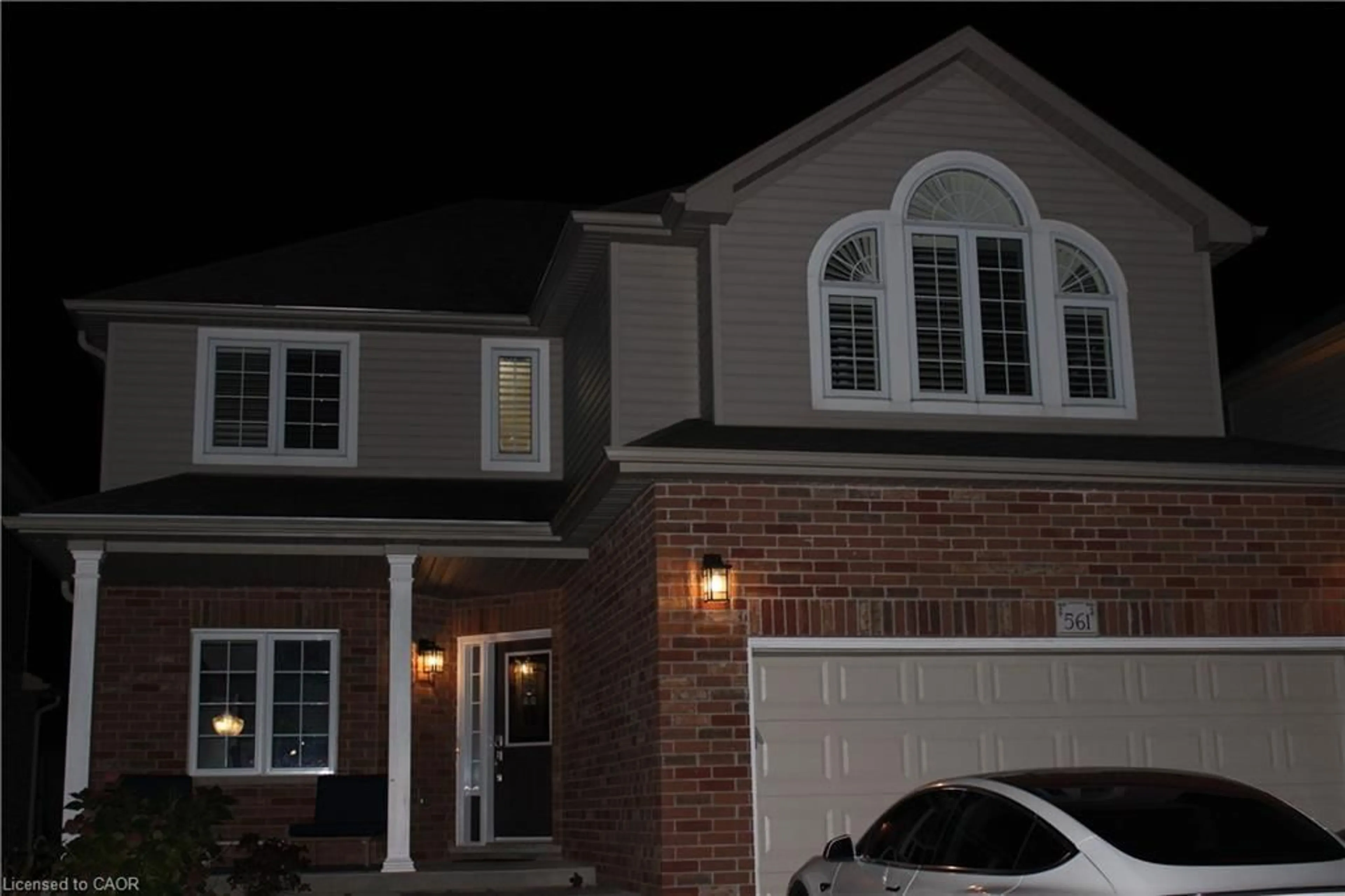Home with brick exterior material, street for 561 Thomas Slee Dr, Kitchener Ontario N2P 2Y7
