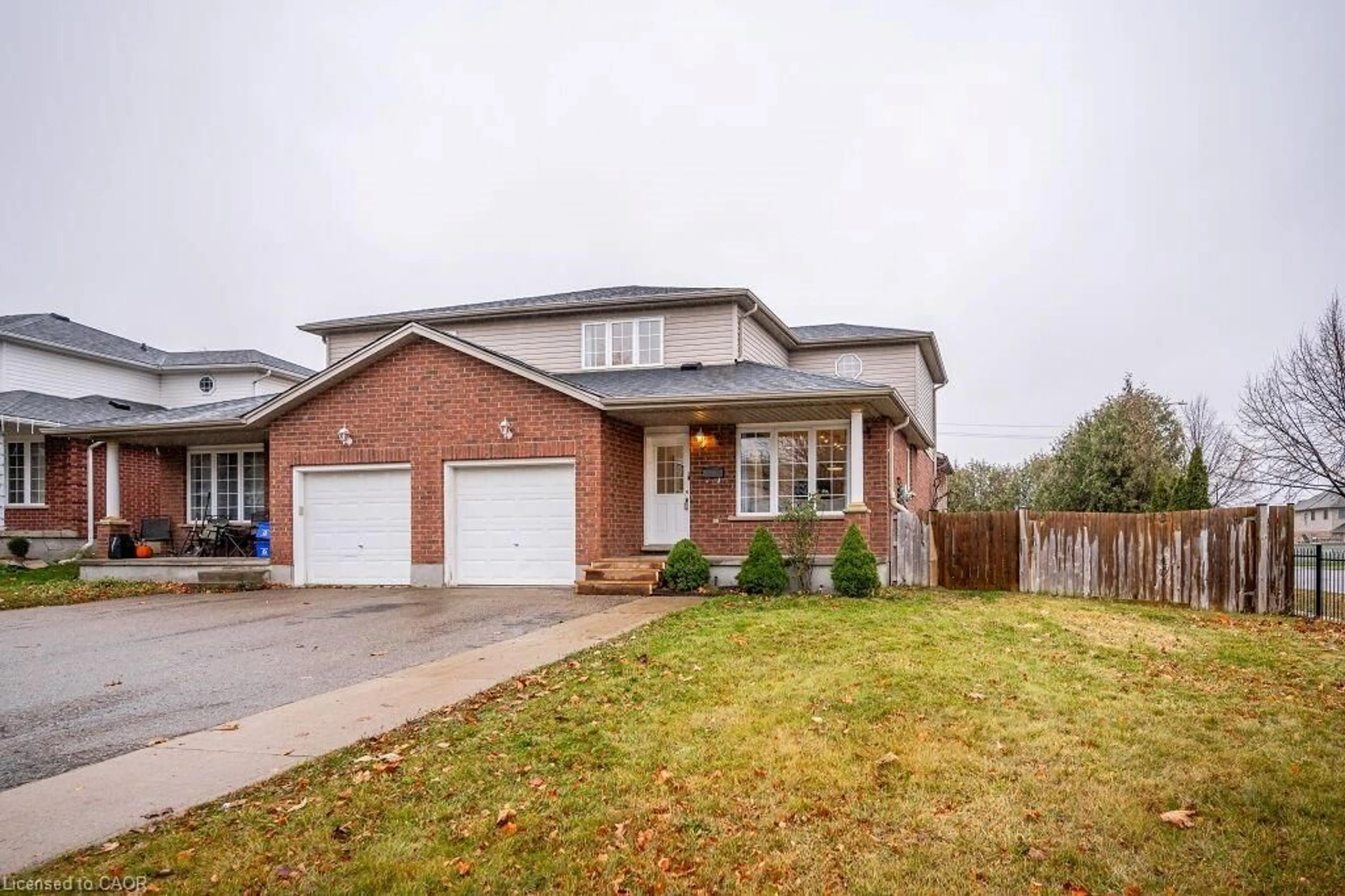 Home with brick exterior material, street for 61 Schueller St, Kitchener Ontario N2K 3W2