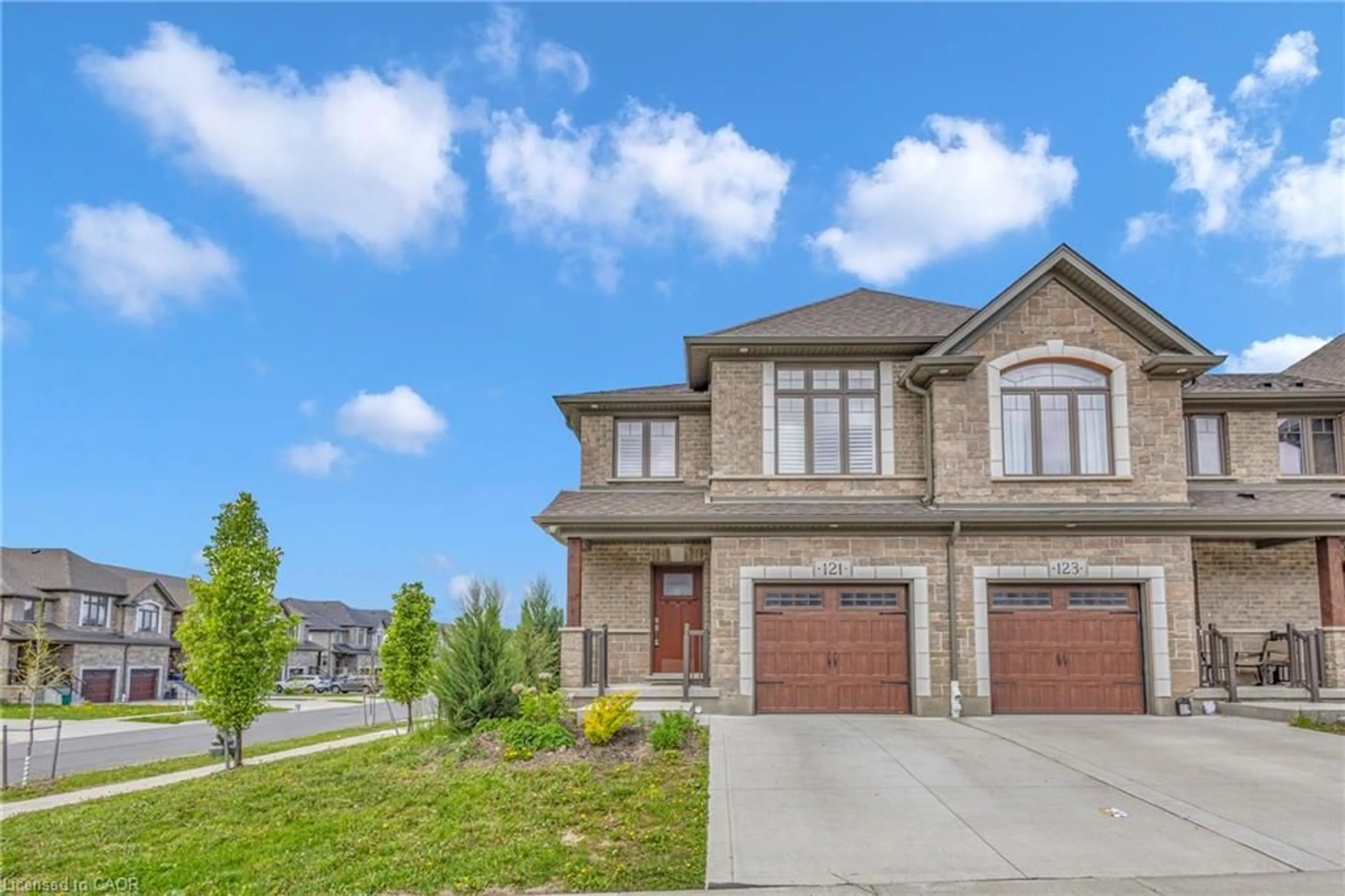 Home with brick exterior material, street for 121 Hollybrook Trail, Kitchener Ontario N2R 0P1