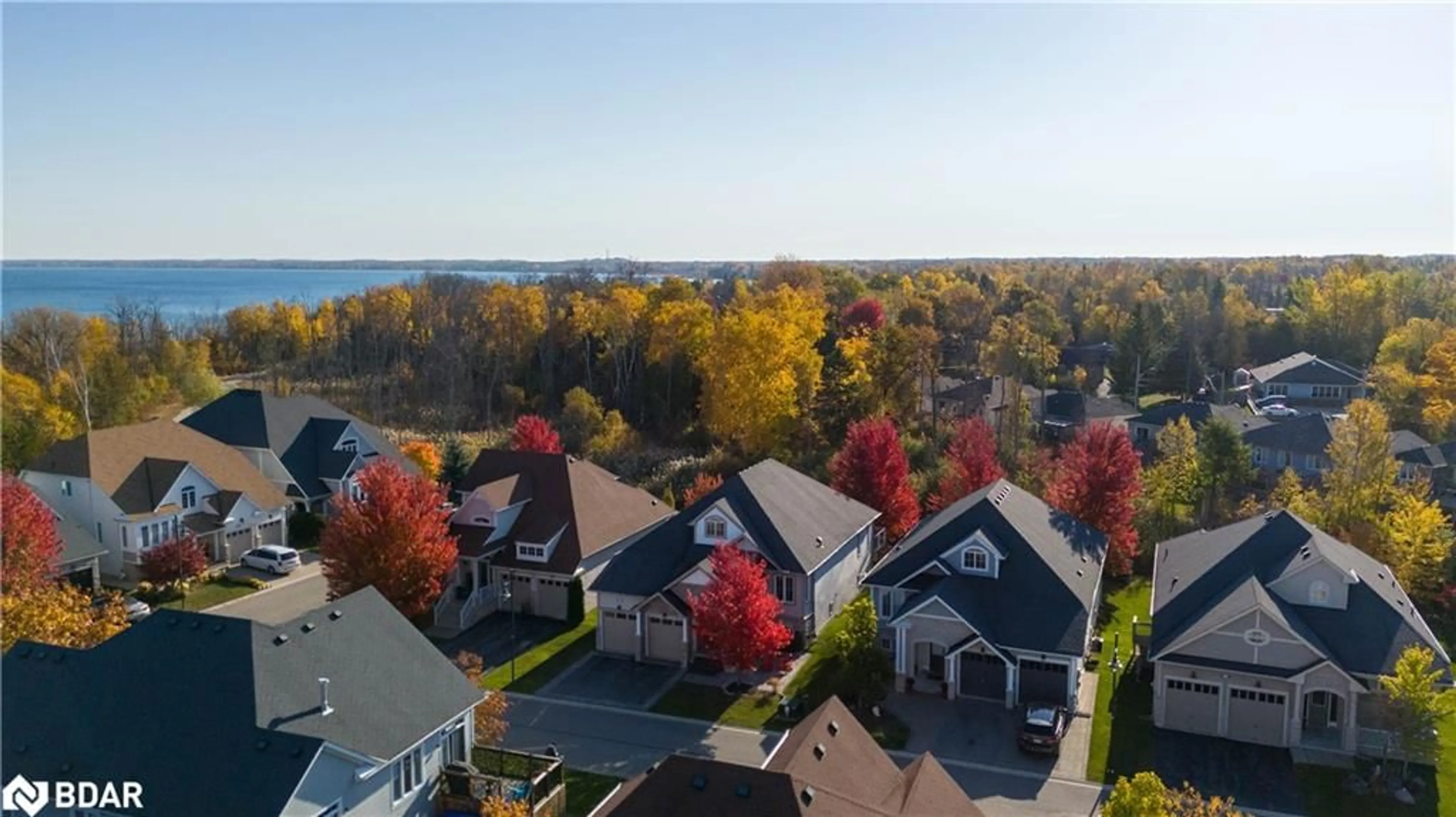 A pic from outside/outdoor area/front of a property/back of a property/a pic from drone, water/lake/river/ocean view for 44 Starboard Cir, Wasaga Beach Ontario L9Z 0E9