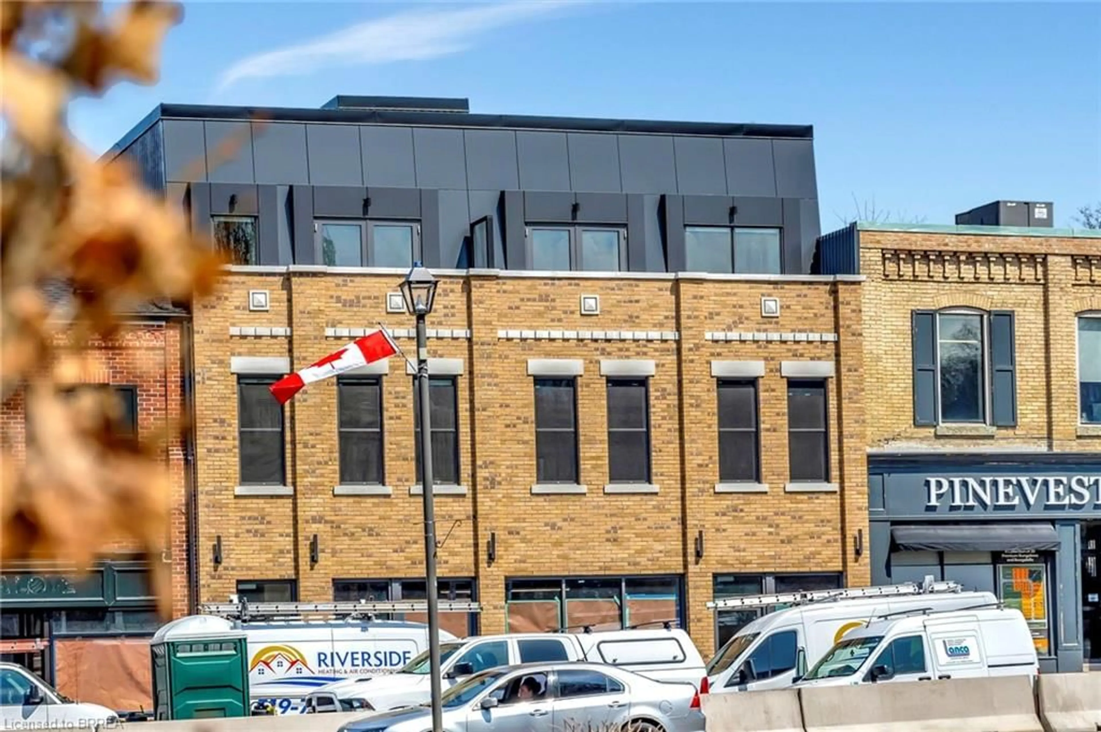 A pic from outside/outdoor area/front of a property/back of a property/a pic from drone, building for 7 Grand River St #203, Paris Ontario N3L 2L9