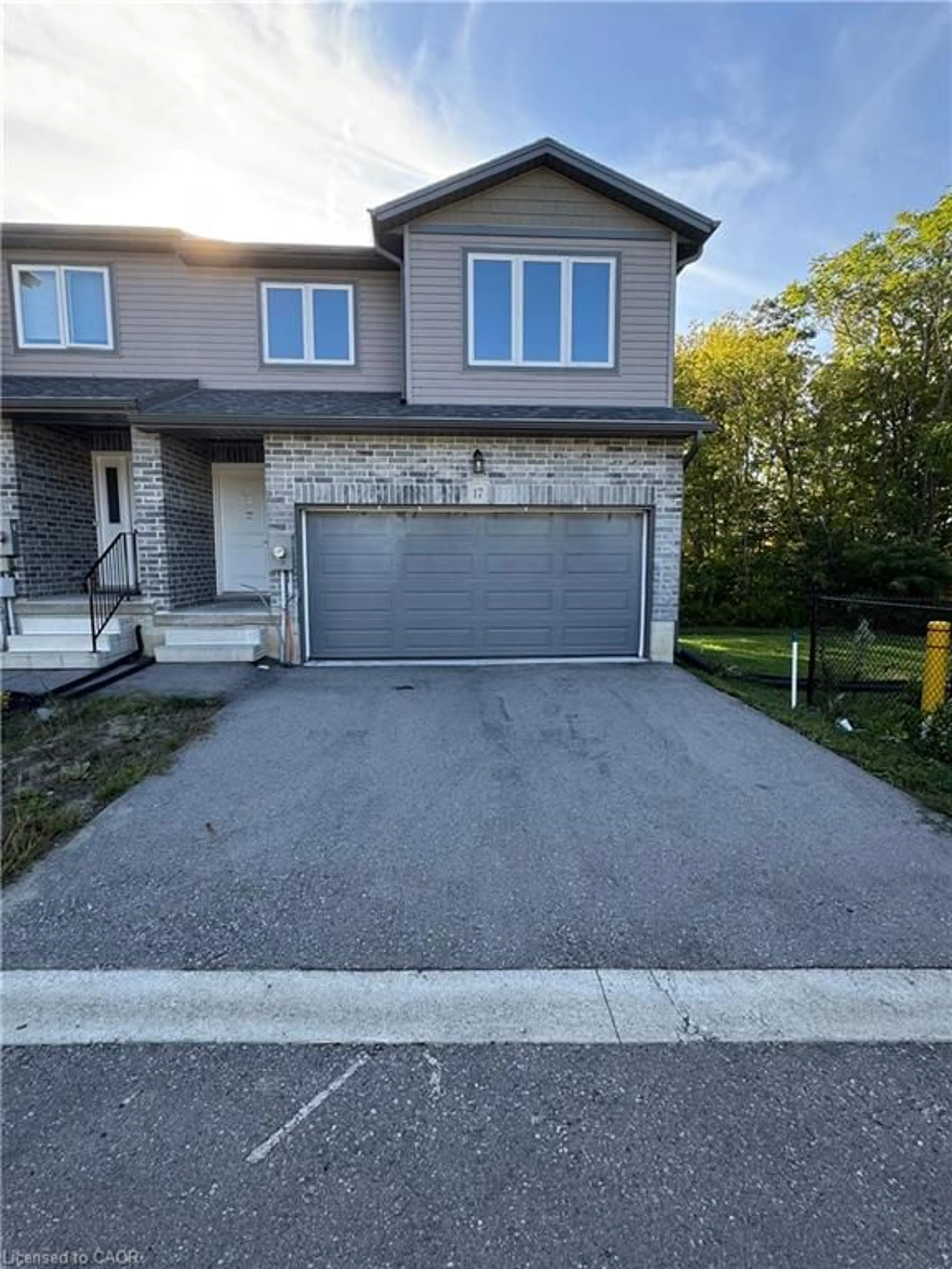 A pic from outside/outdoor area/front of a property/back of a property/a pic from drone, street for 61 Vienna Rd #17, Tillsonburg Ontario N4G 3C6