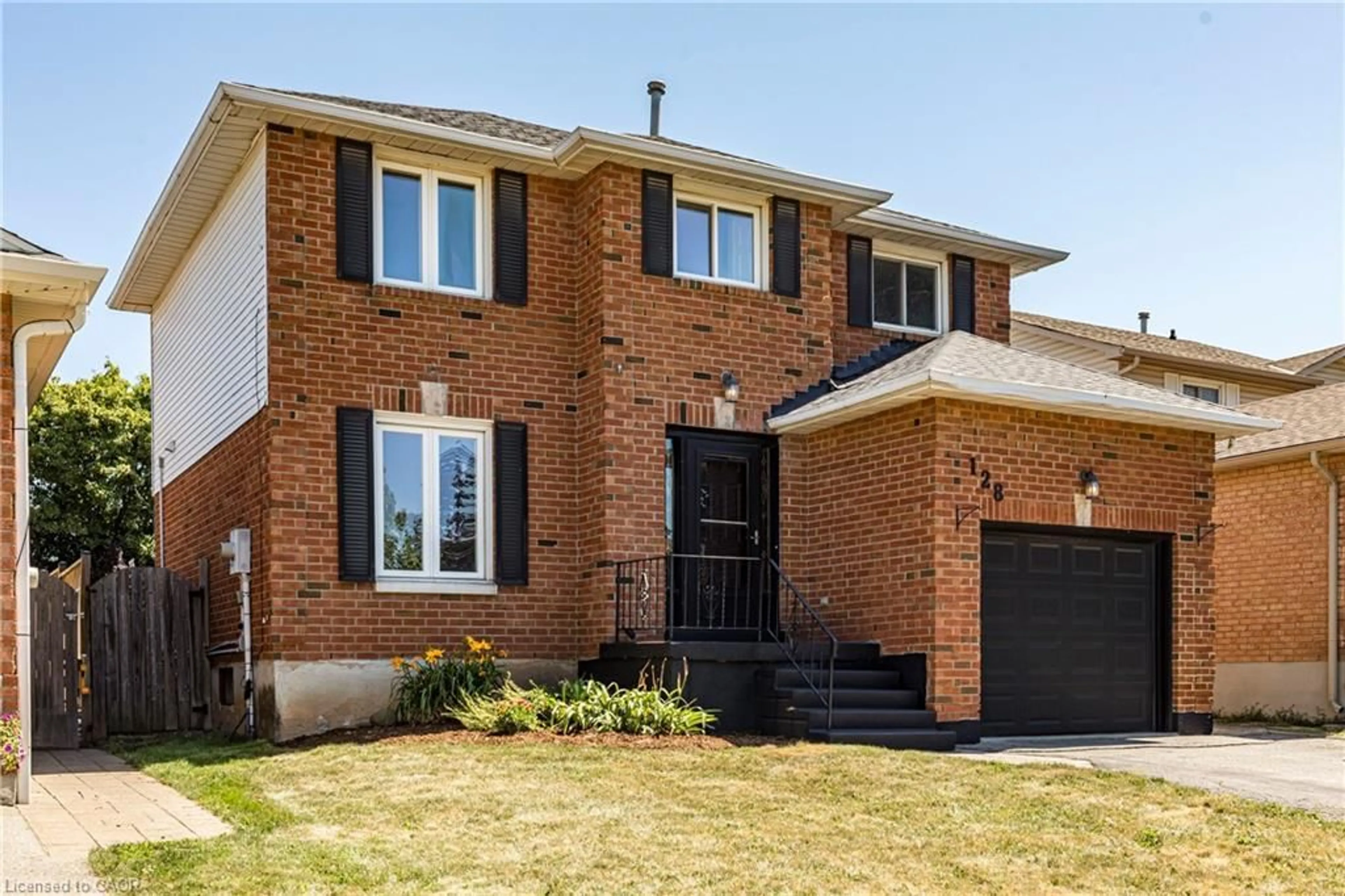 Home with brick exterior material, street for 128 Brian Blvd, Waterdown Ontario L8B 0C8