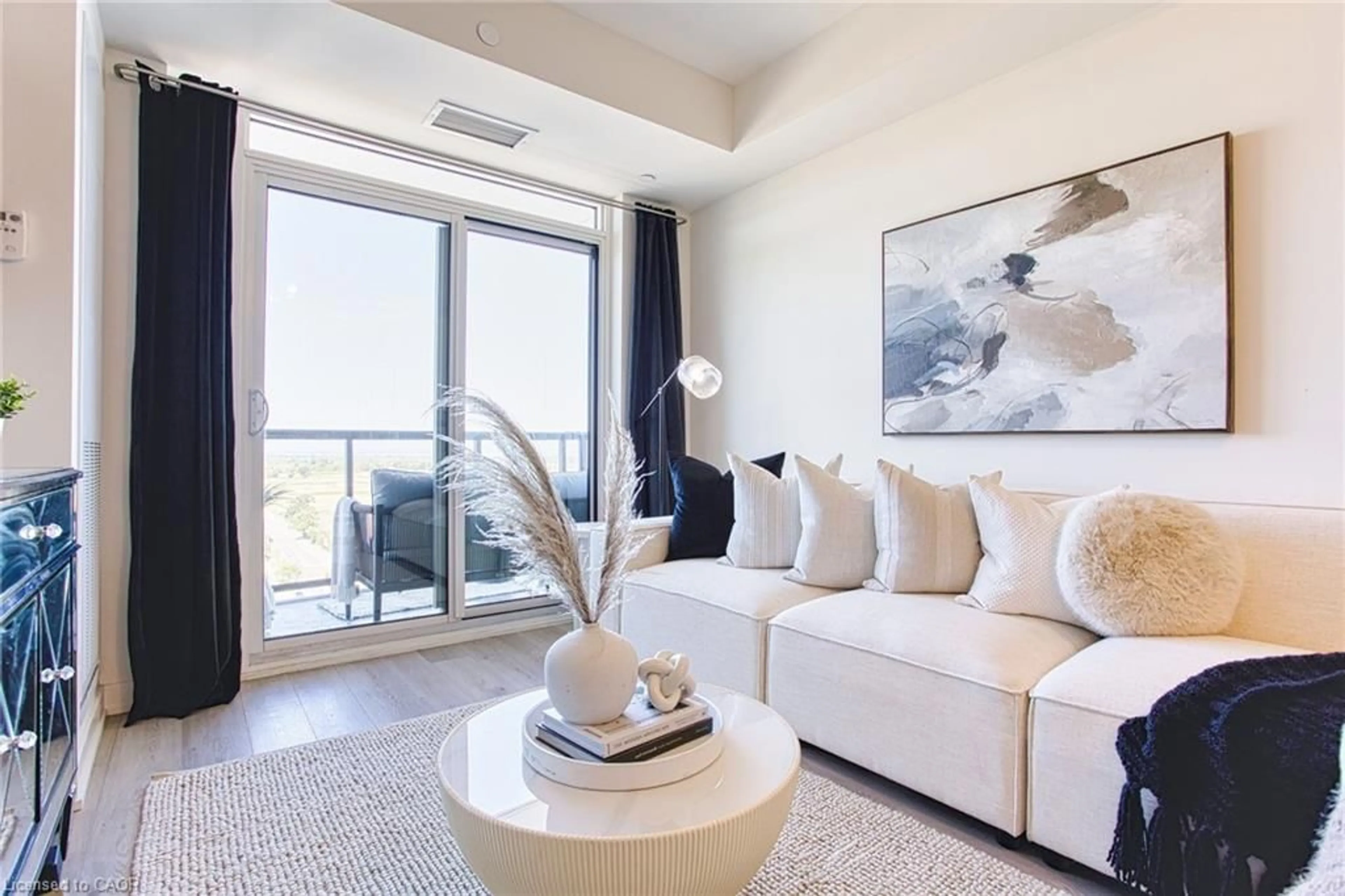 Living room with furniture, unknown for 385 Winston Rd #1204, Grimsby Ontario L3M 0J3