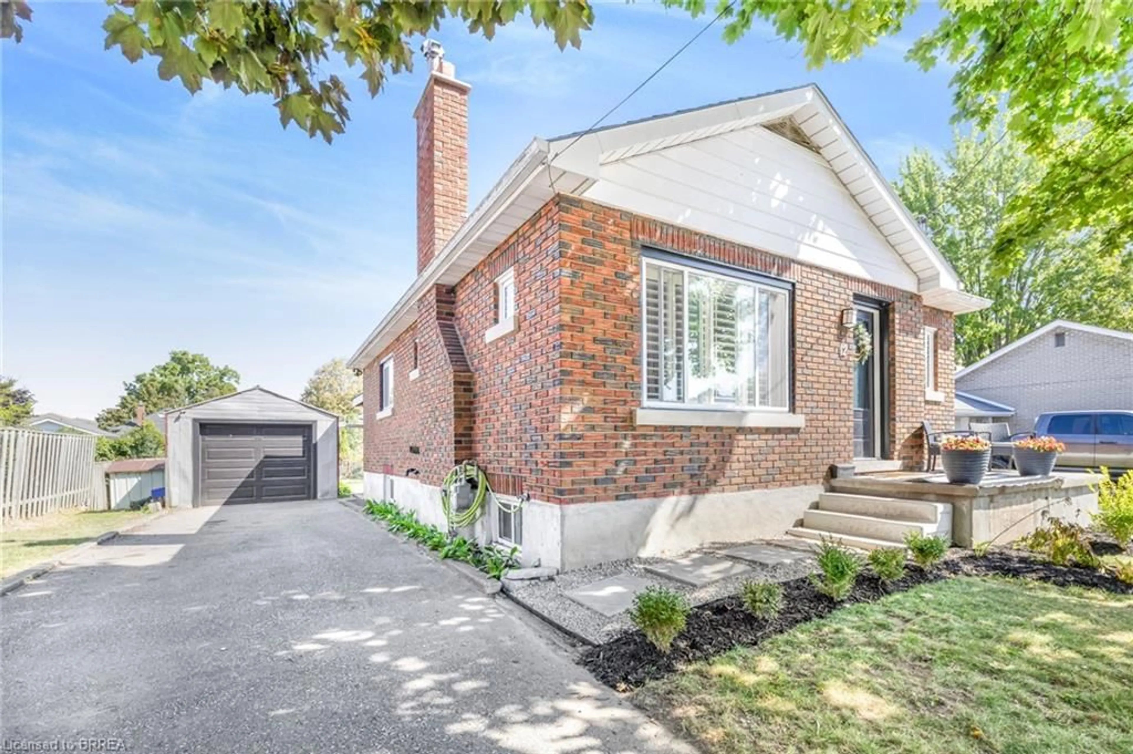 Home with brick exterior material, street for 12 Patricia St, Brantford Ontario N3T 1W5