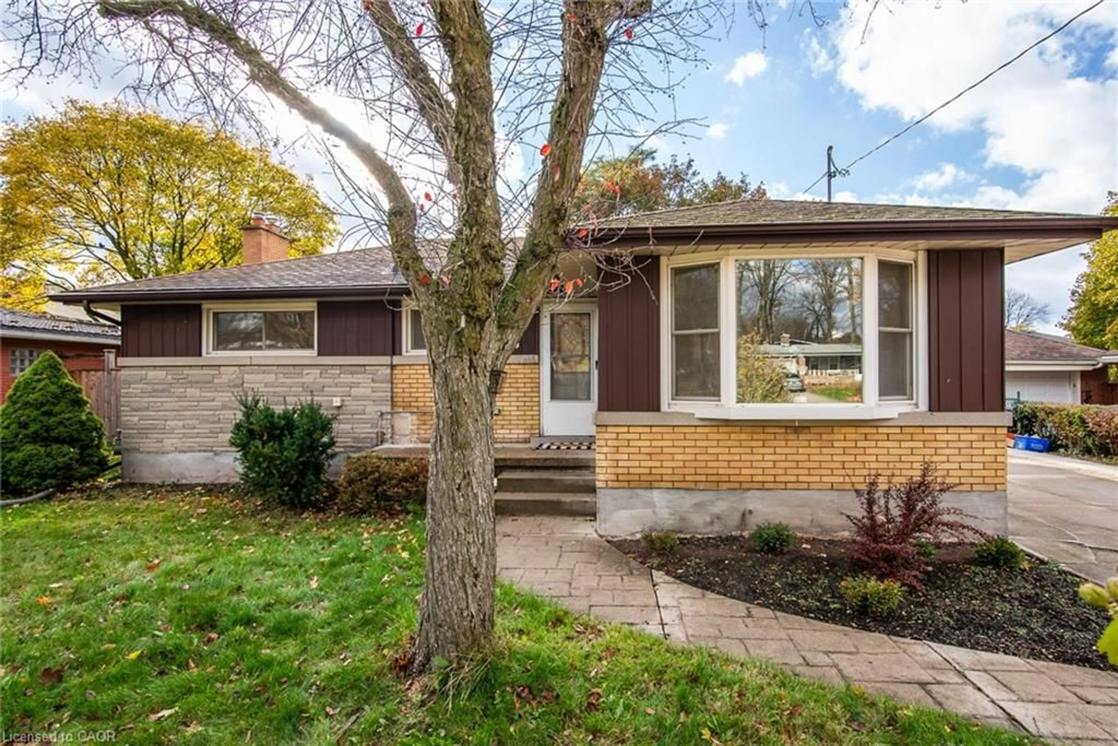 Home with brick exterior material, street for 63 Ellis Cres, Waterloo Ontario N2J 2B5