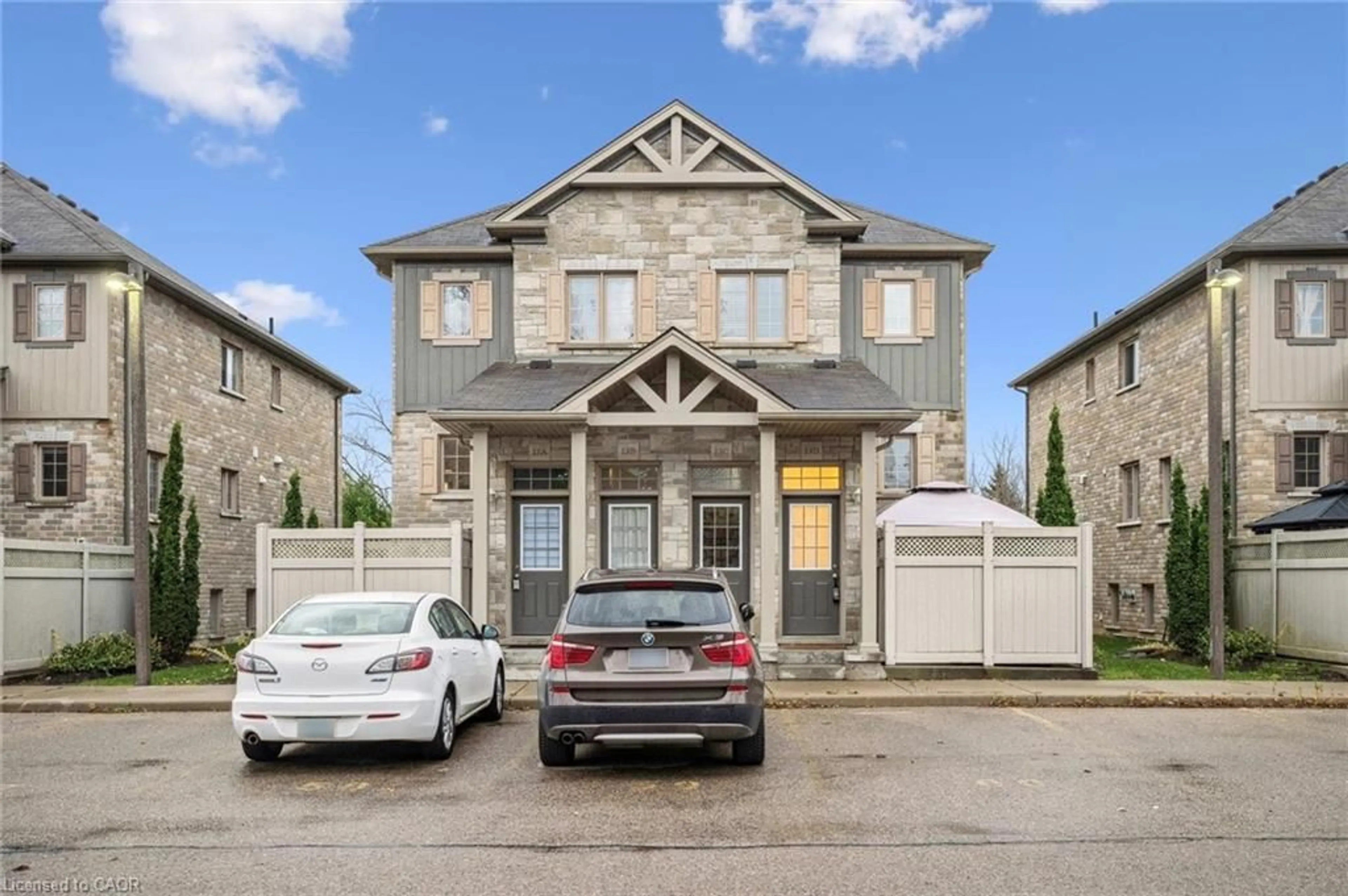 Home with brick exterior material, street for 931 Glasgow St #13D, Waterloo Ontario N2N 0B6