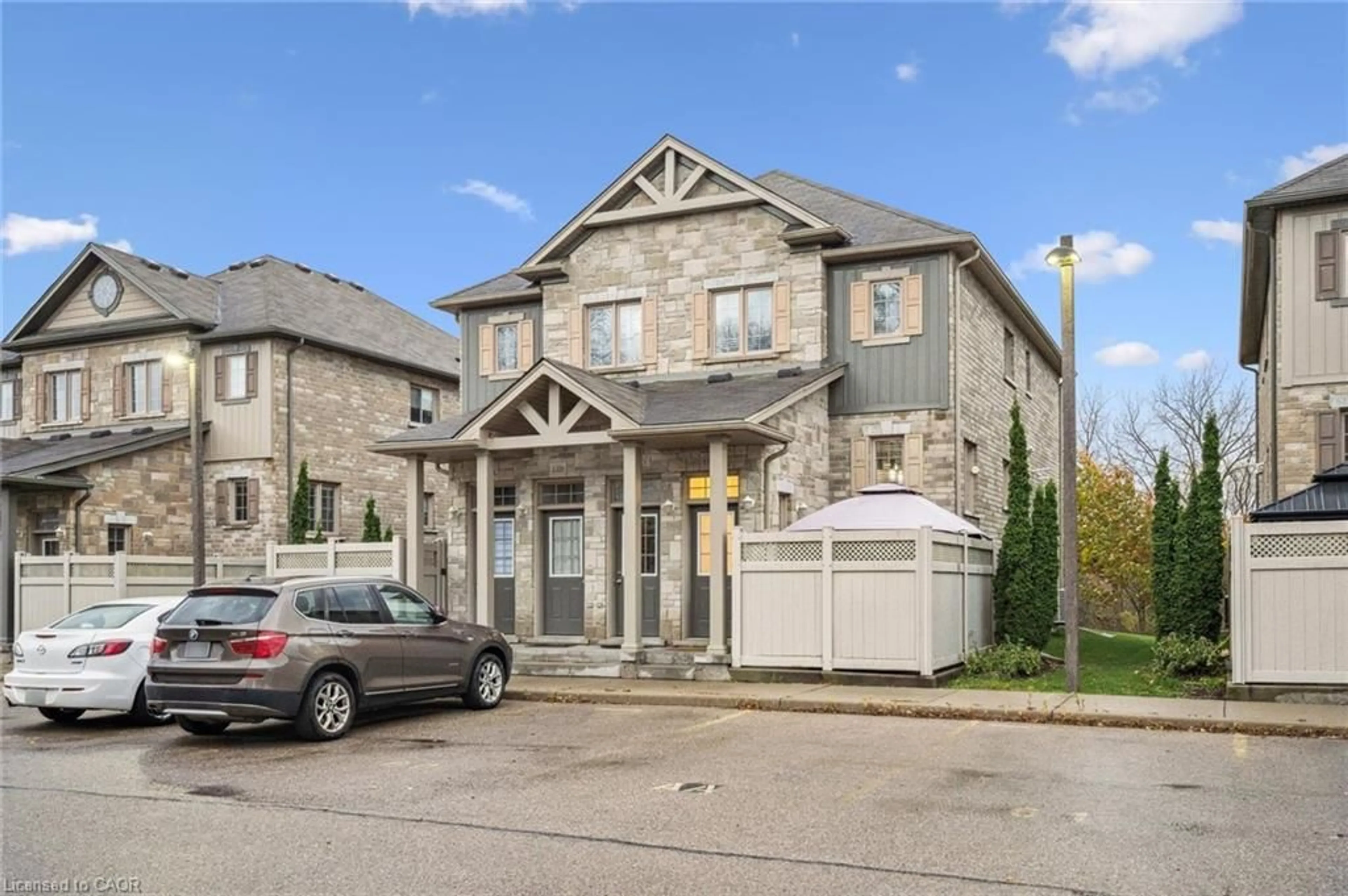 Home with brick exterior material, street for 931 Glasgow St #13D, Waterloo Ontario N2N 0B6