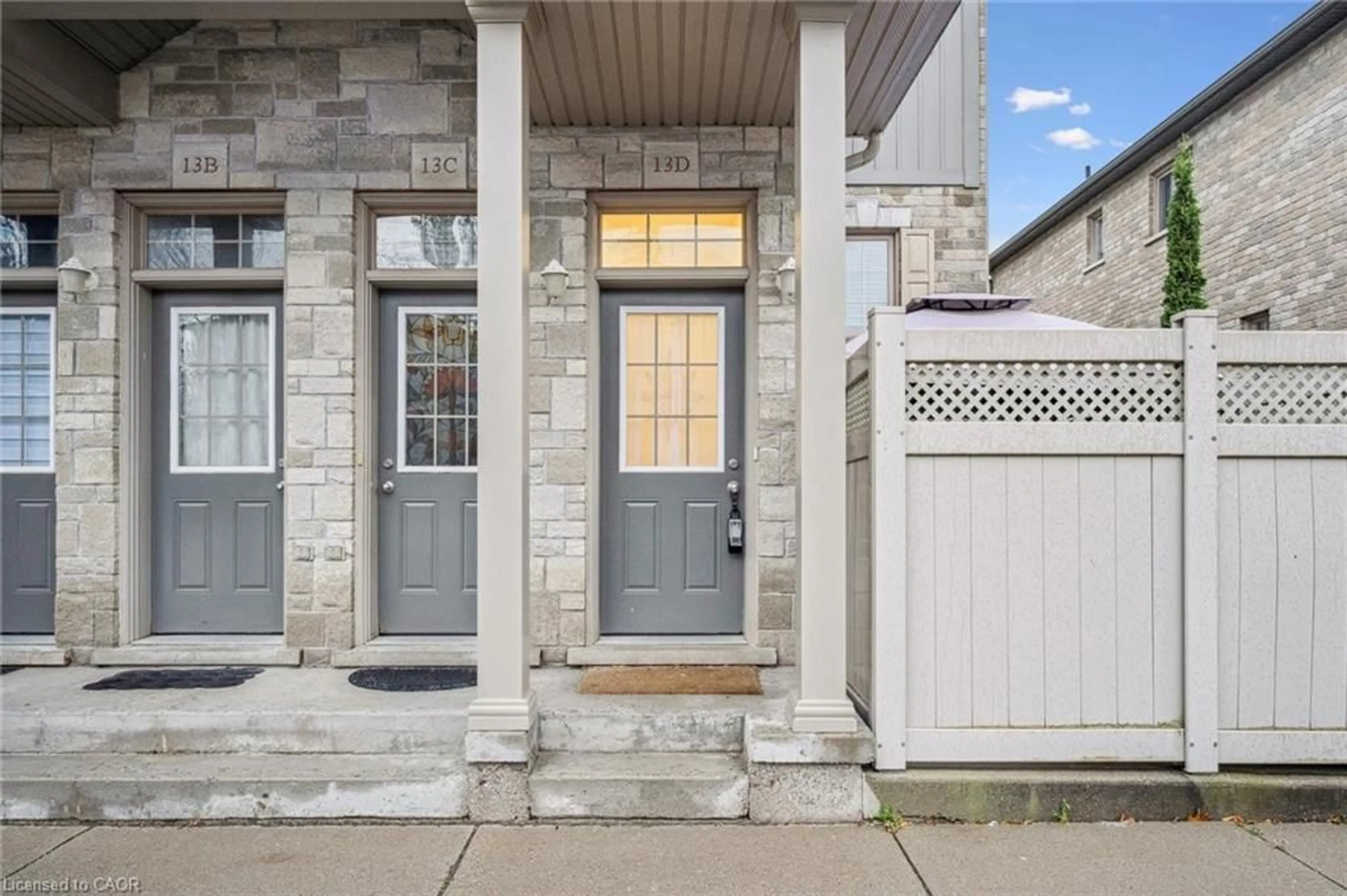 Home with brick exterior material, street for 931 Glasgow St #13D, Waterloo Ontario N2N 0B6