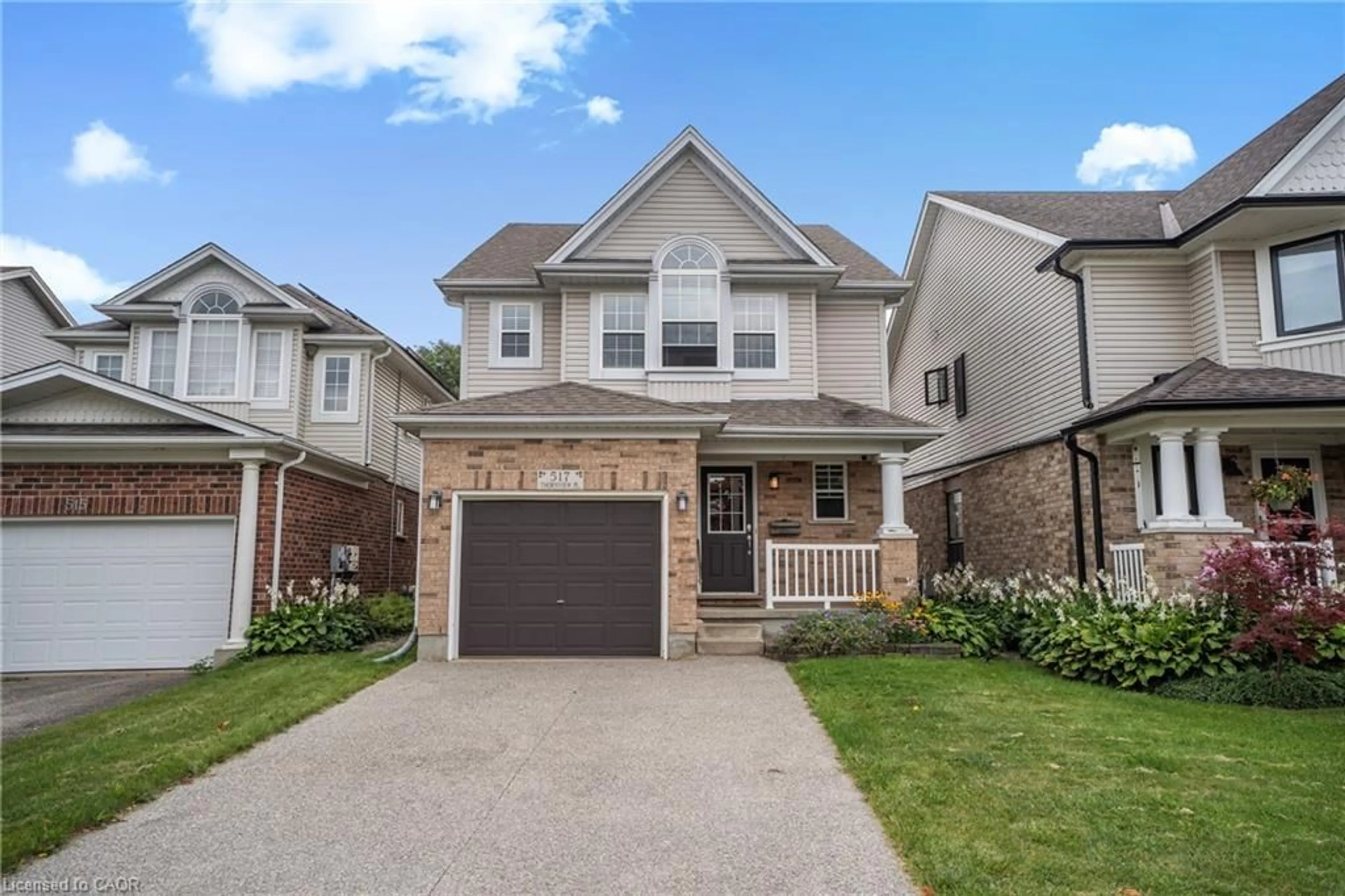 Home with brick exterior material, street for 517 Thornview Pl, Waterloo Ontario N2T 2V9