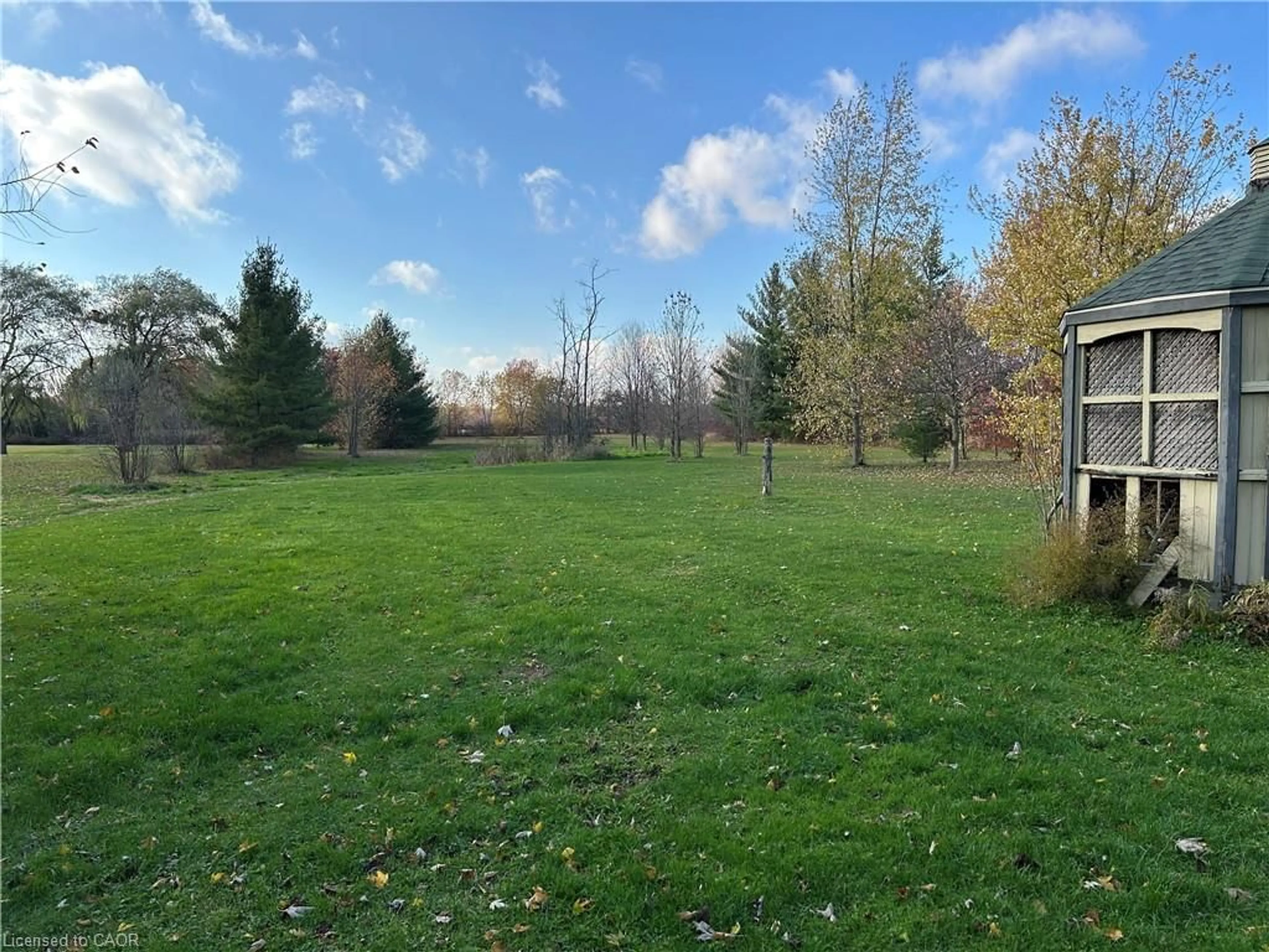 A pic from outside/outdoor area/front of a property/back of a property/a pic from drone, forest/trees view for 7760 3 Hwy, Dunnville Ontario N1A 2W4