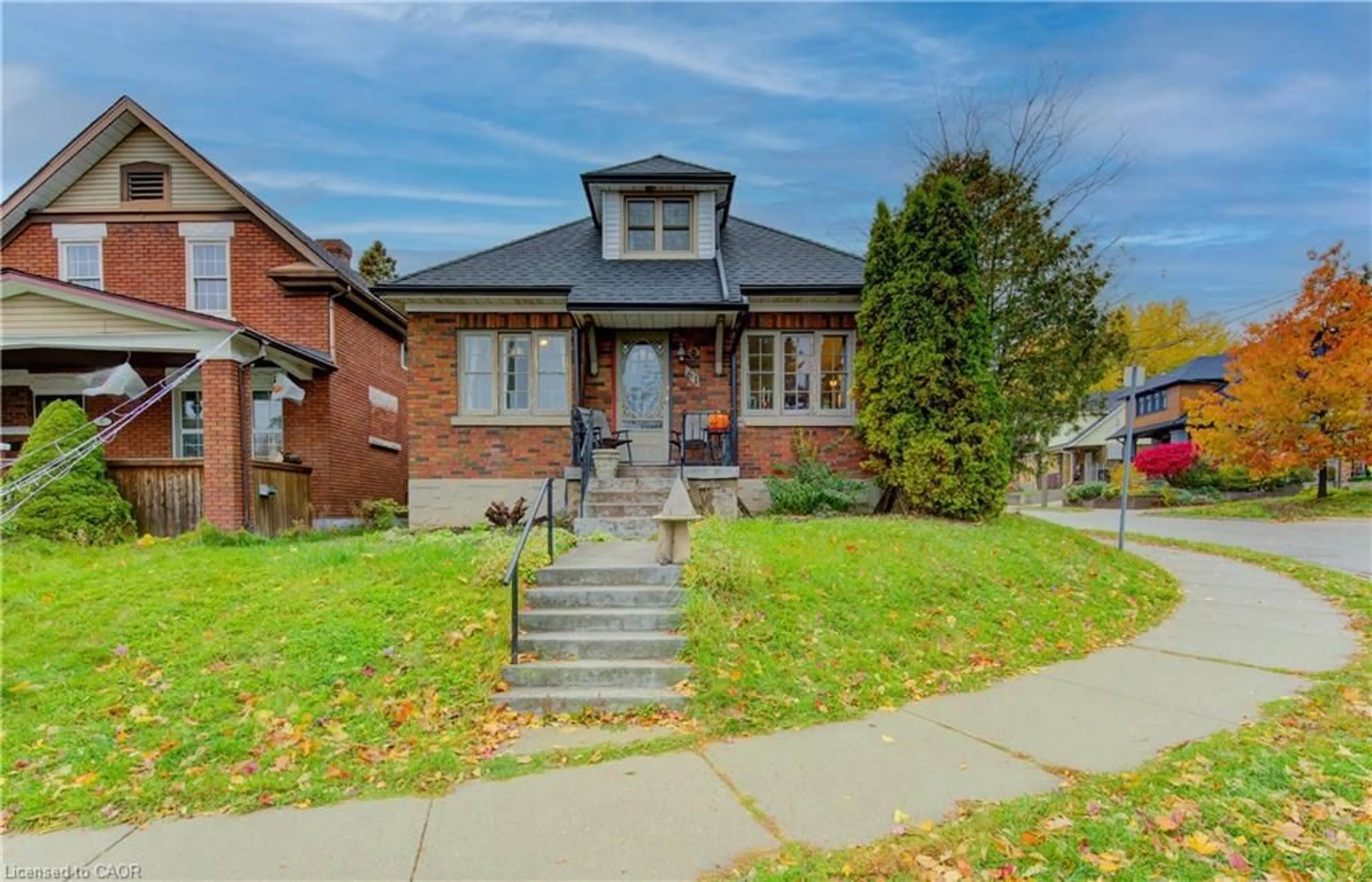 Home with brick exterior material, street for 61 Gruhn St, Kitchener Ontario N2G 1S5