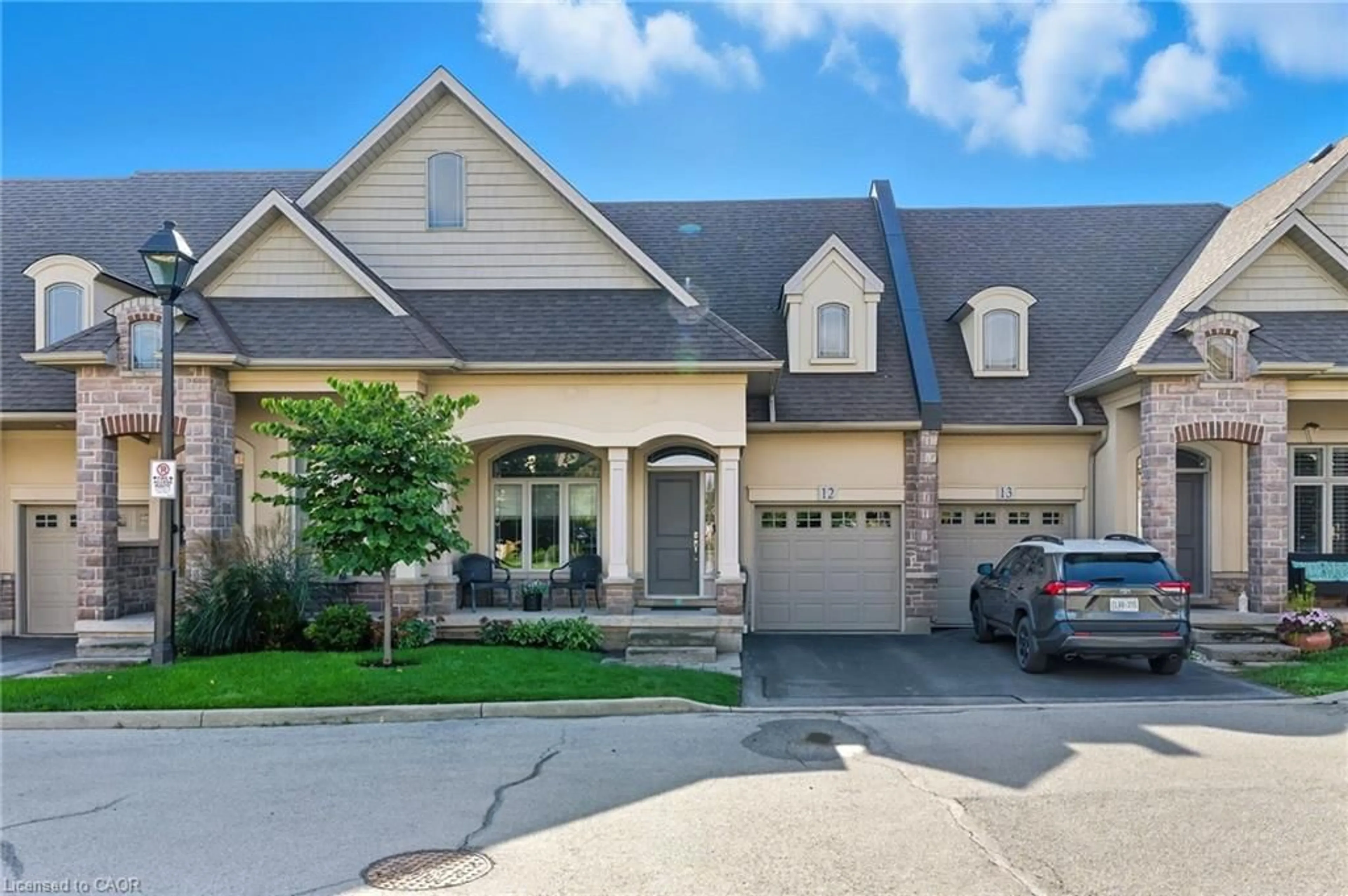 Home with brick exterior material, street for 5056 New St #12, Burlington Ontario L7L 0H4