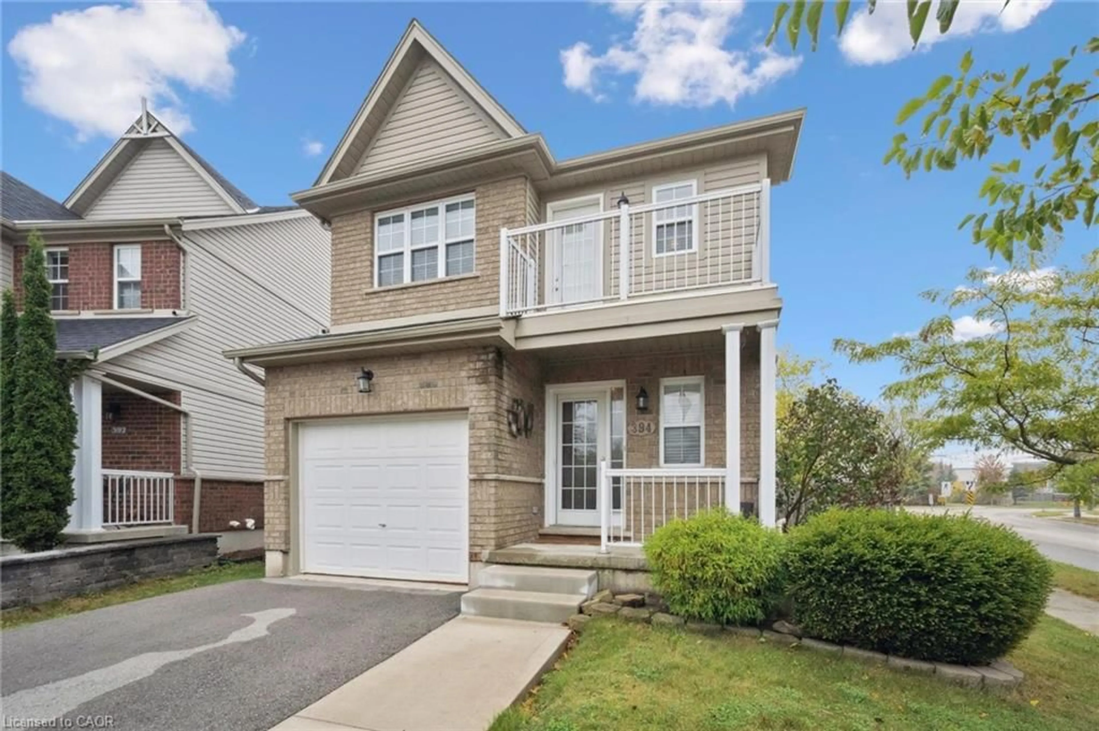 Home with vinyl exterior material, street for 394 Sauve Cres, Waterloo Ontario N2T 2Y9
