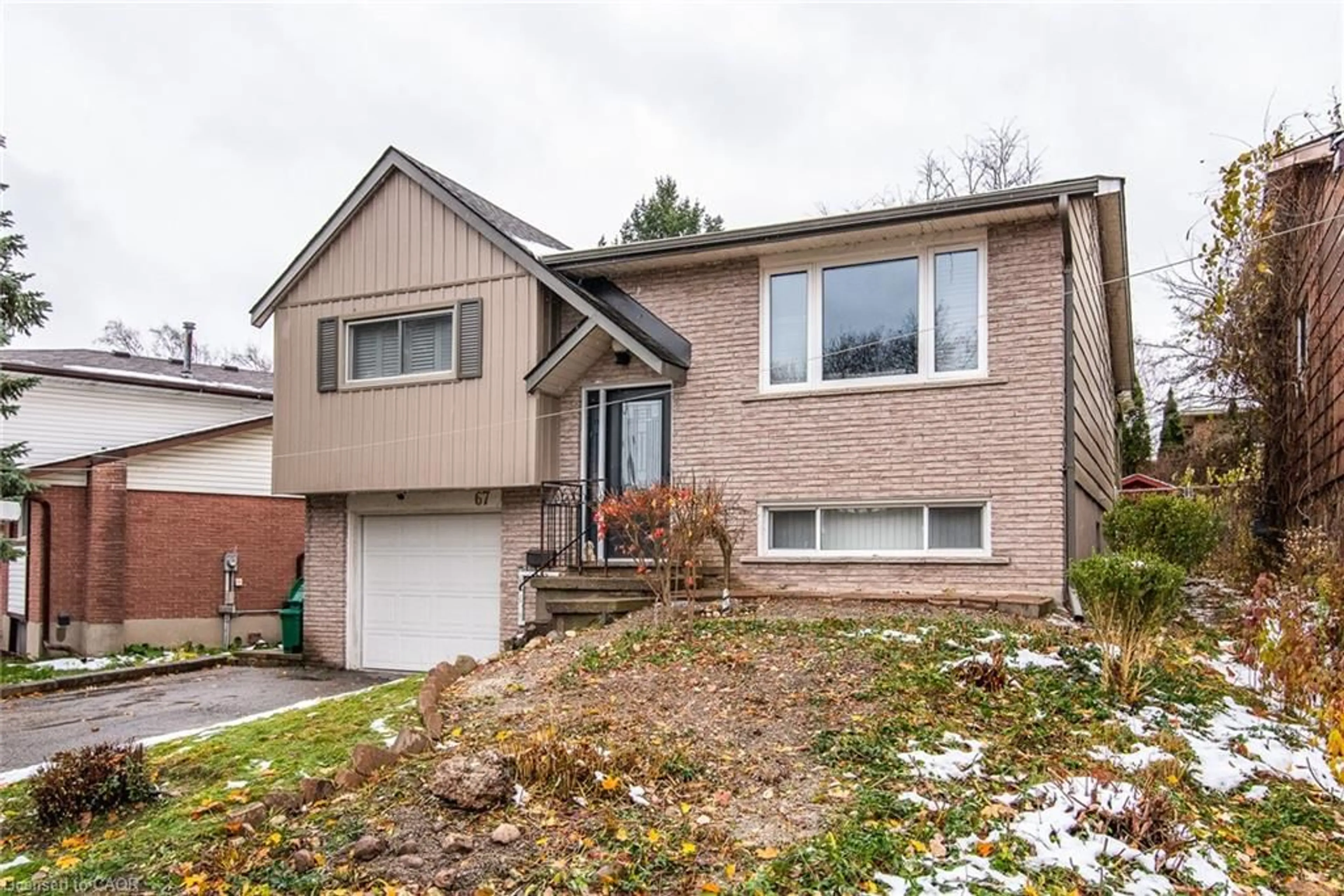Home with brick exterior material, street for 67 Pinemeadow Cres, Waterloo Ontario N2T 1A6