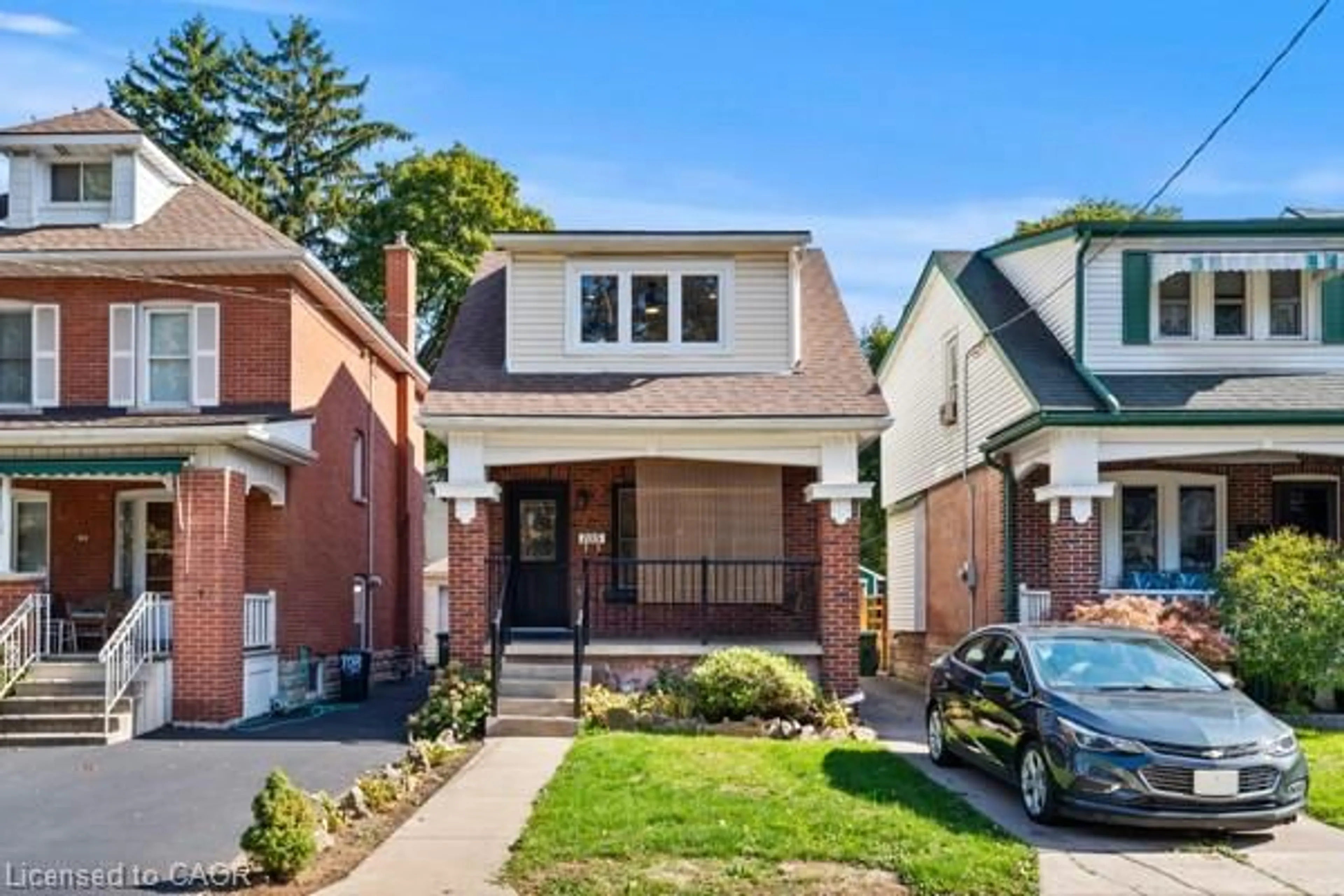 Home with brick exterior material, street for 105 Rothsay Ave, Hamilton Ontario L8M 3G3