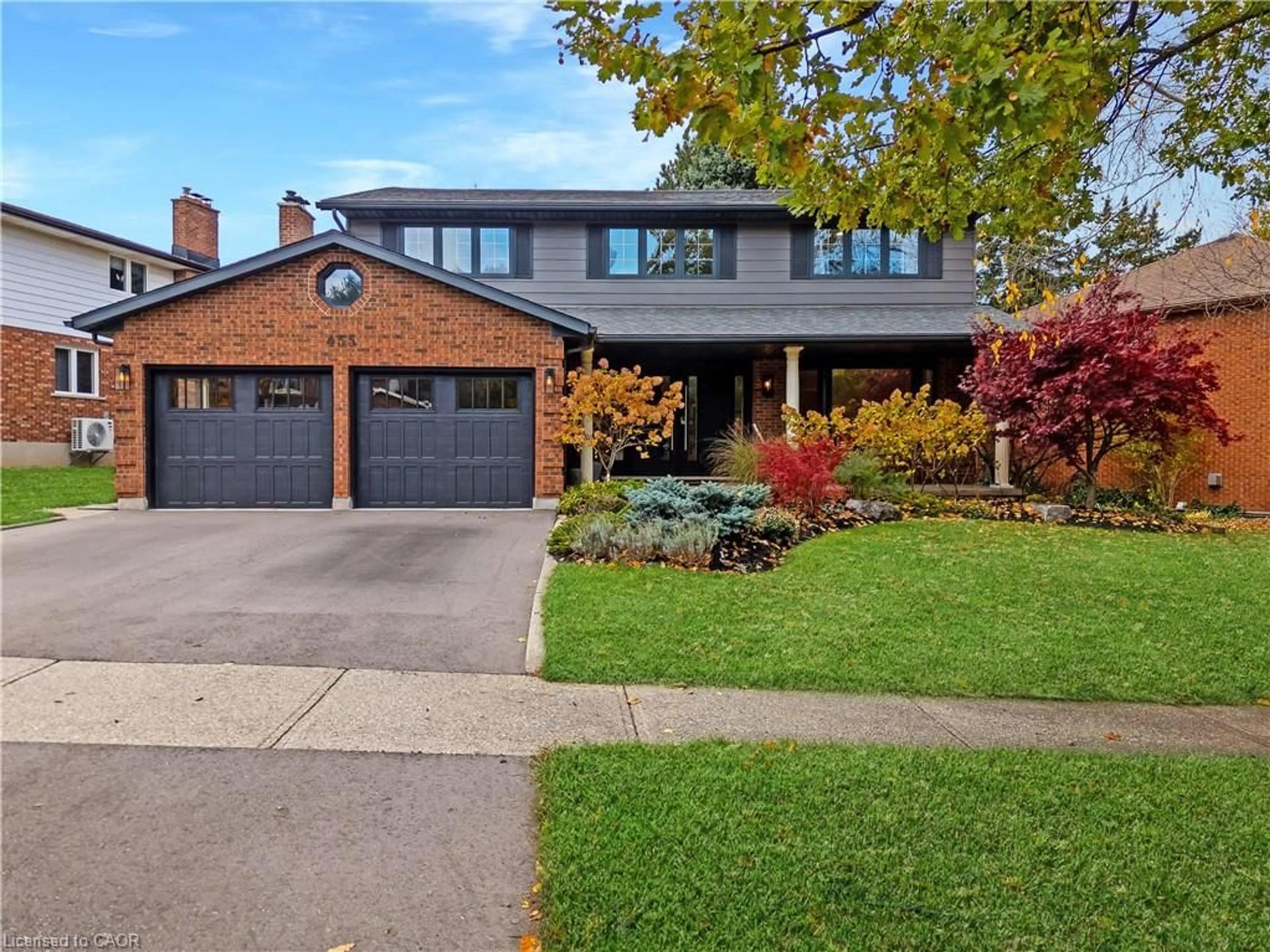 Home with brick exterior material, street for 455 Winchester Dr, Waterloo Ontario N2T 1H6