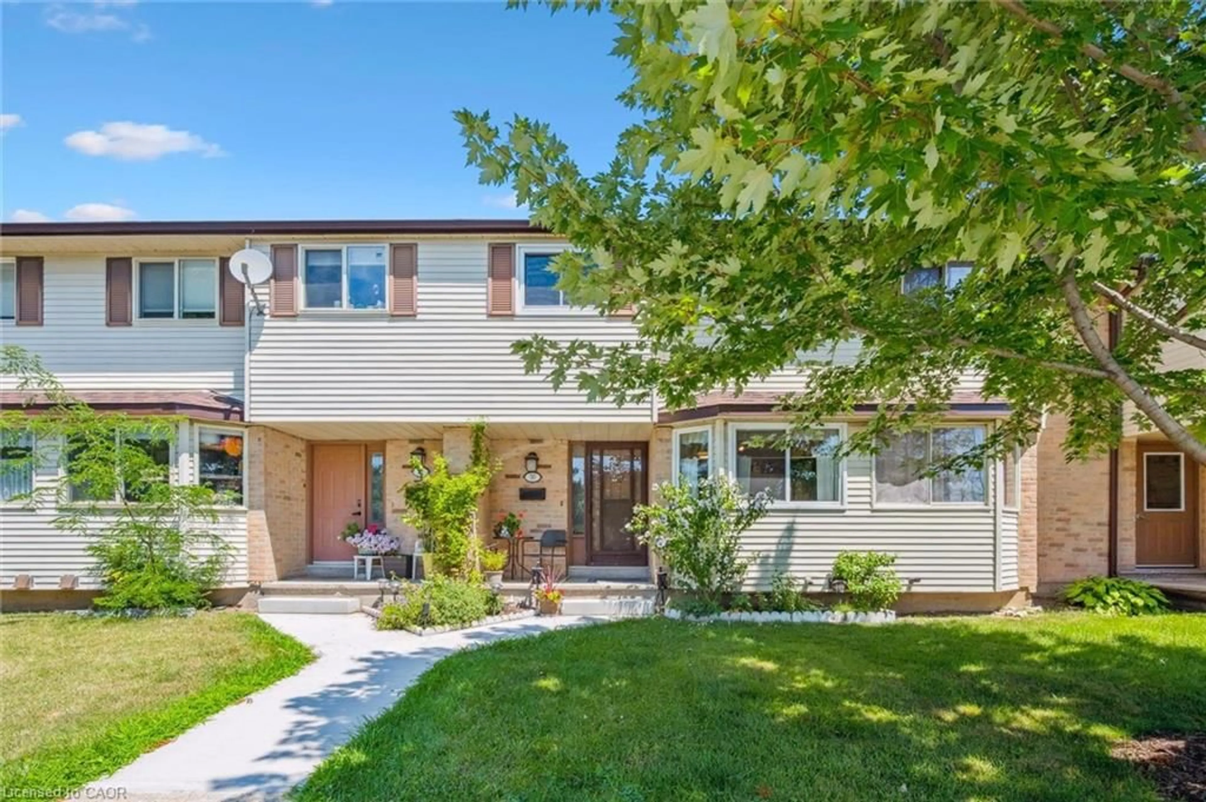 Home with brick exterior material, street for 40 Silvercreek Pky #30, Guelph Ontario N1H 7X5