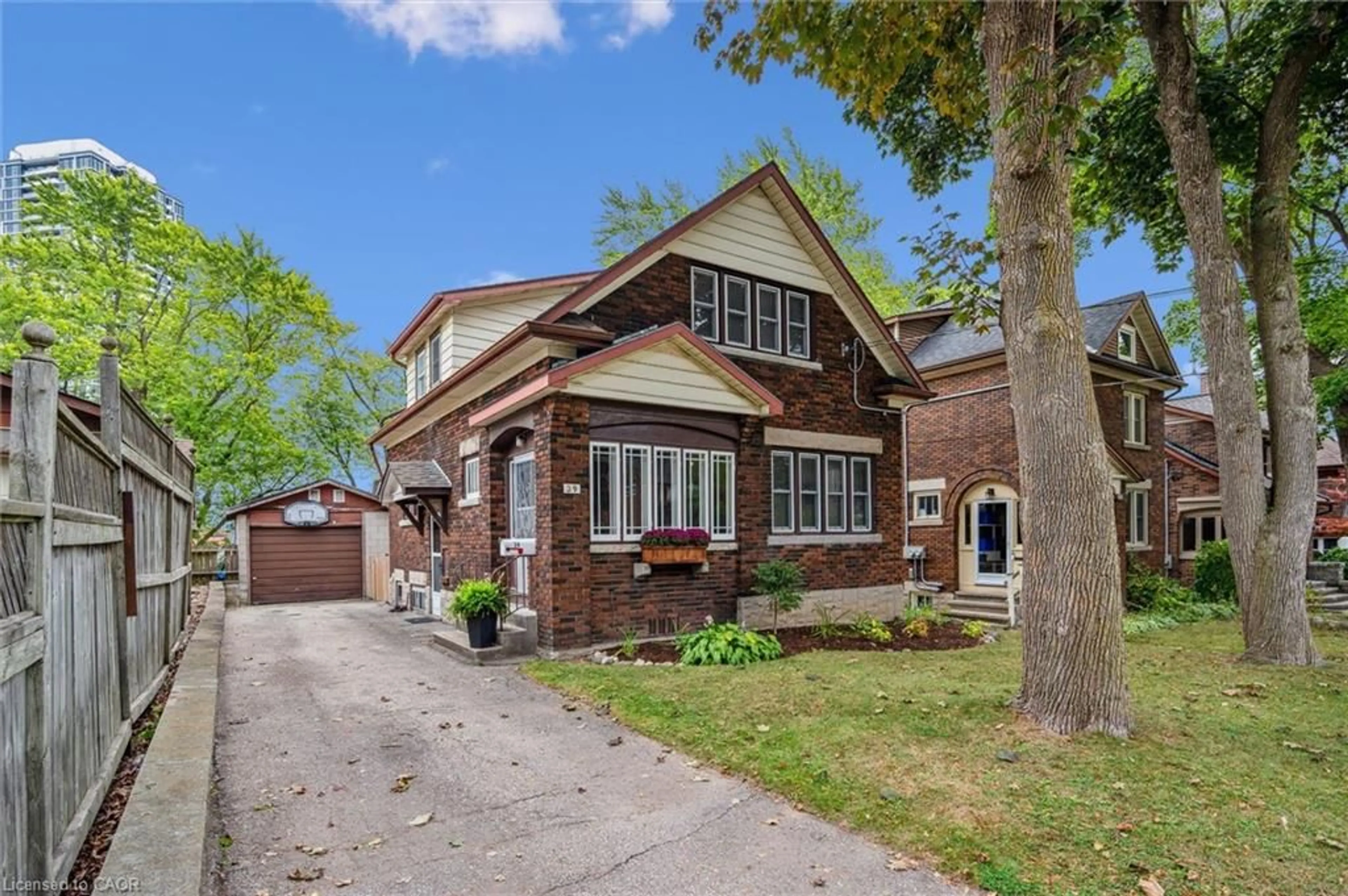 Home with brick exterior material, street for 39 Agnes St, Kitchener Ontario N2G 2E9
