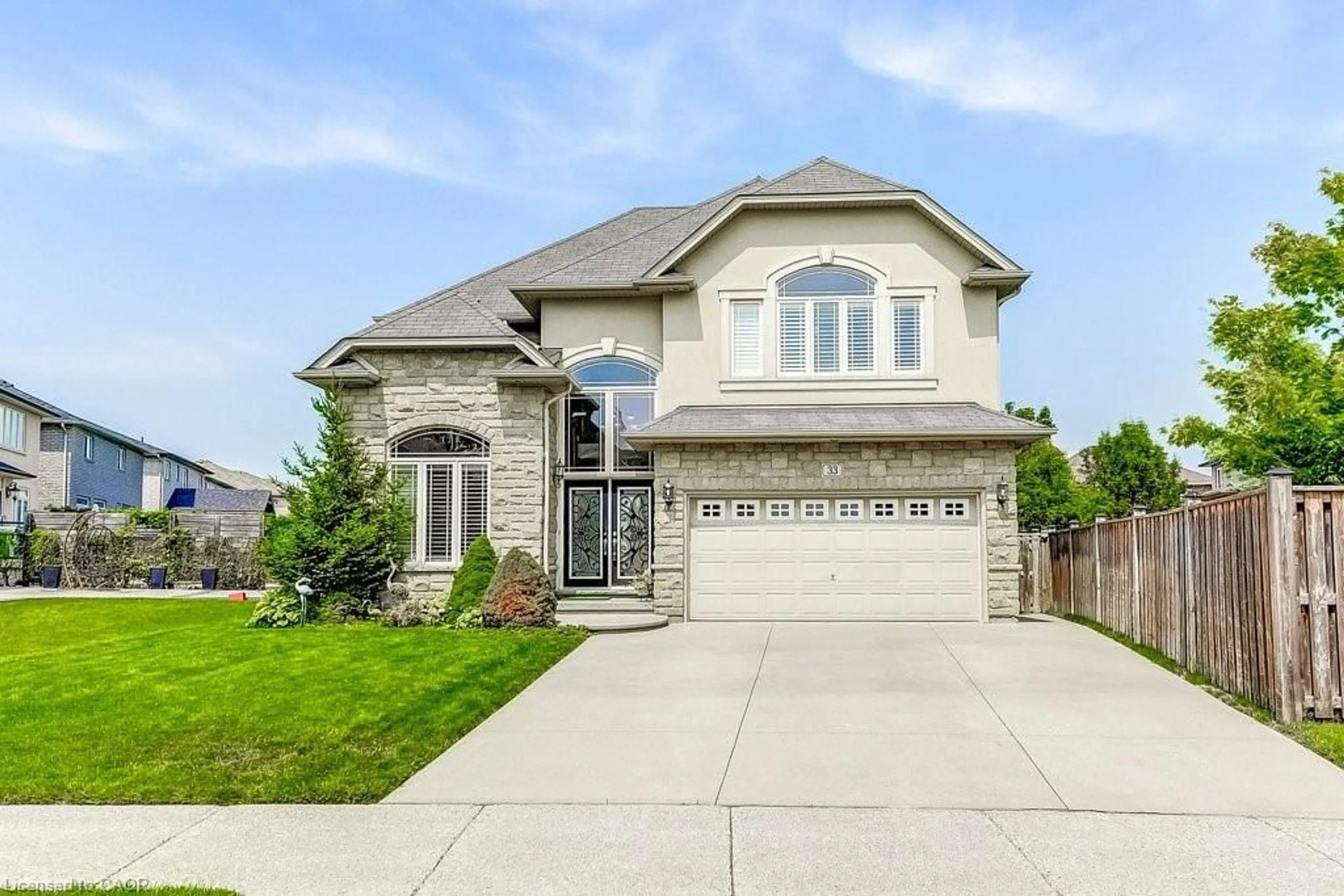 Home with brick exterior material, street for 33 Lockman Dr, Ancaster Ontario L9K 0B9