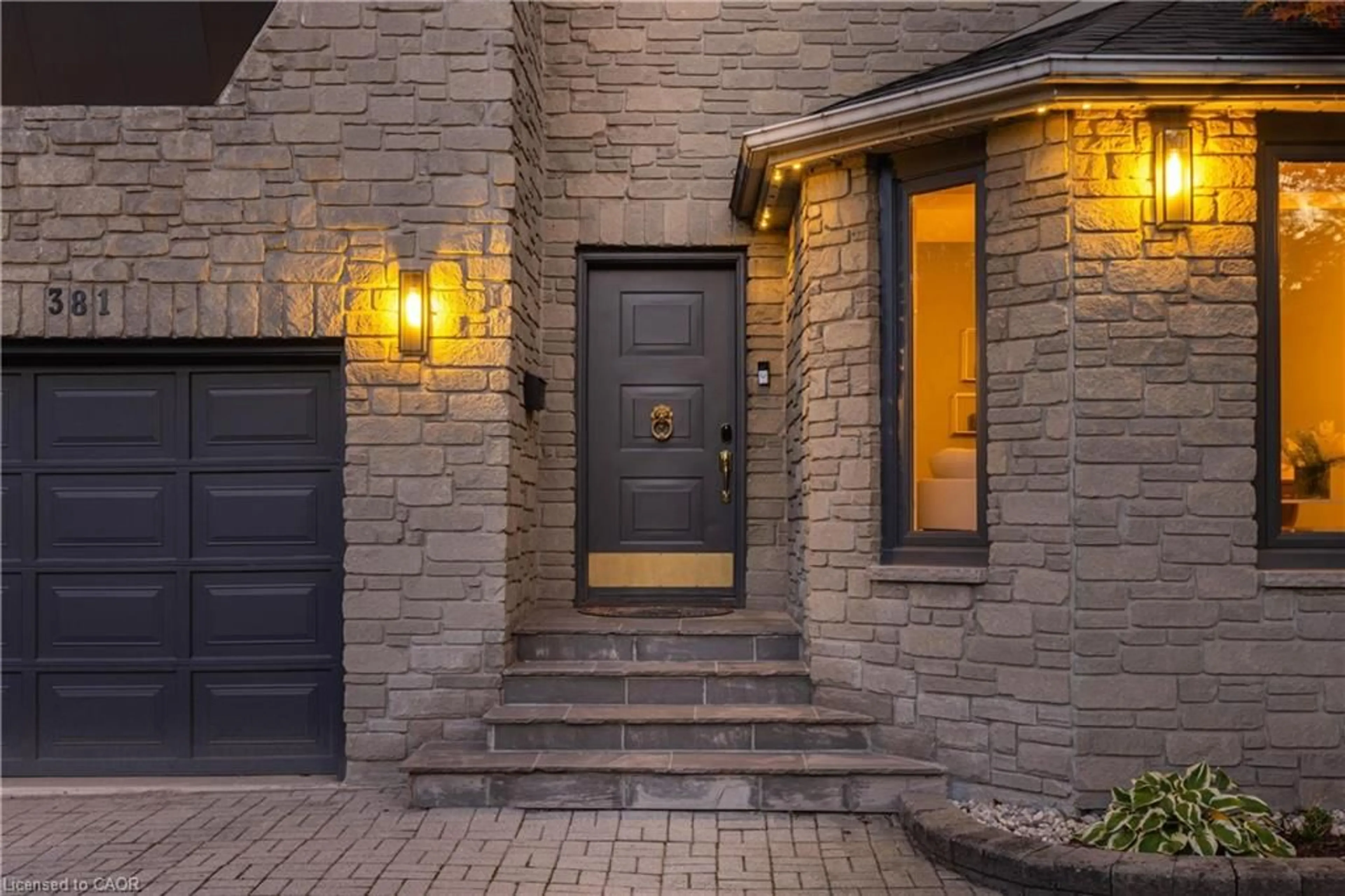 Home with brick exterior material, street for 381 Queen St, Hamilton Ontario L8P 3T8