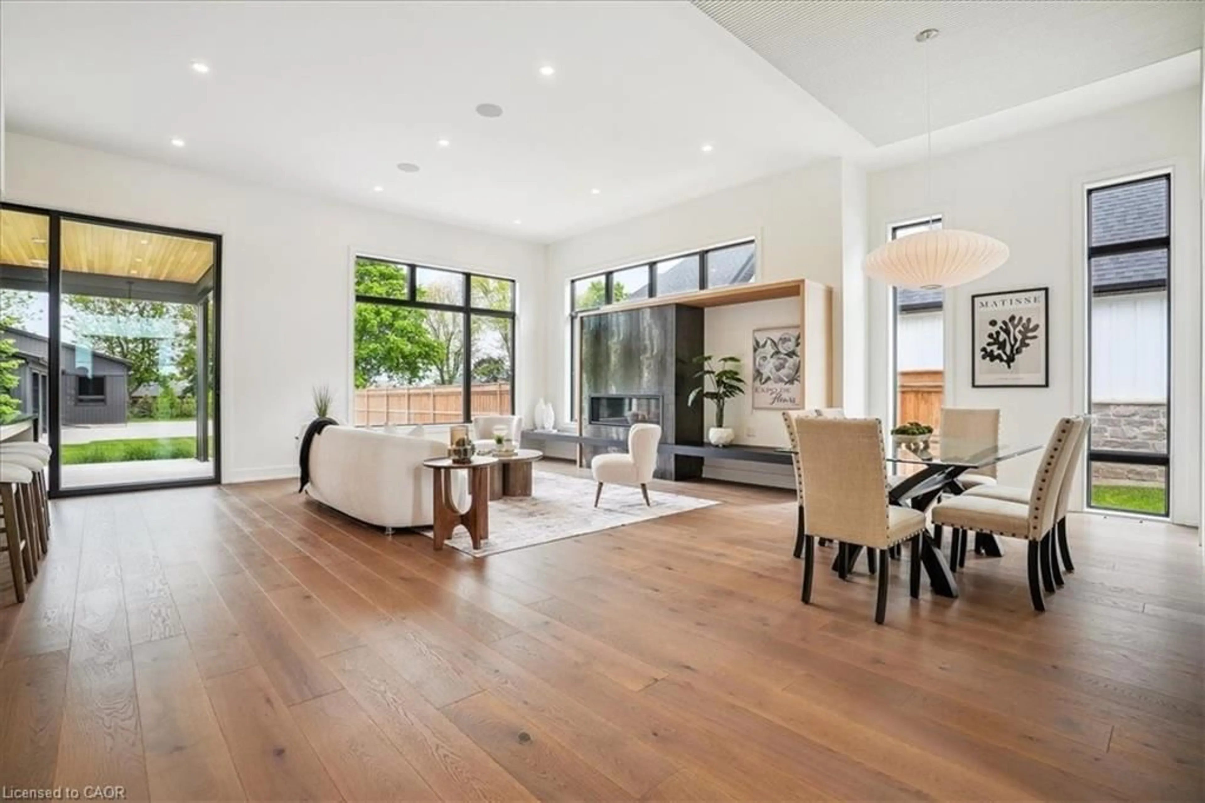 Living room with furniture, wood/laminate floor for 1613 G Lookout St, Fonthill Ontario L3E 0V2