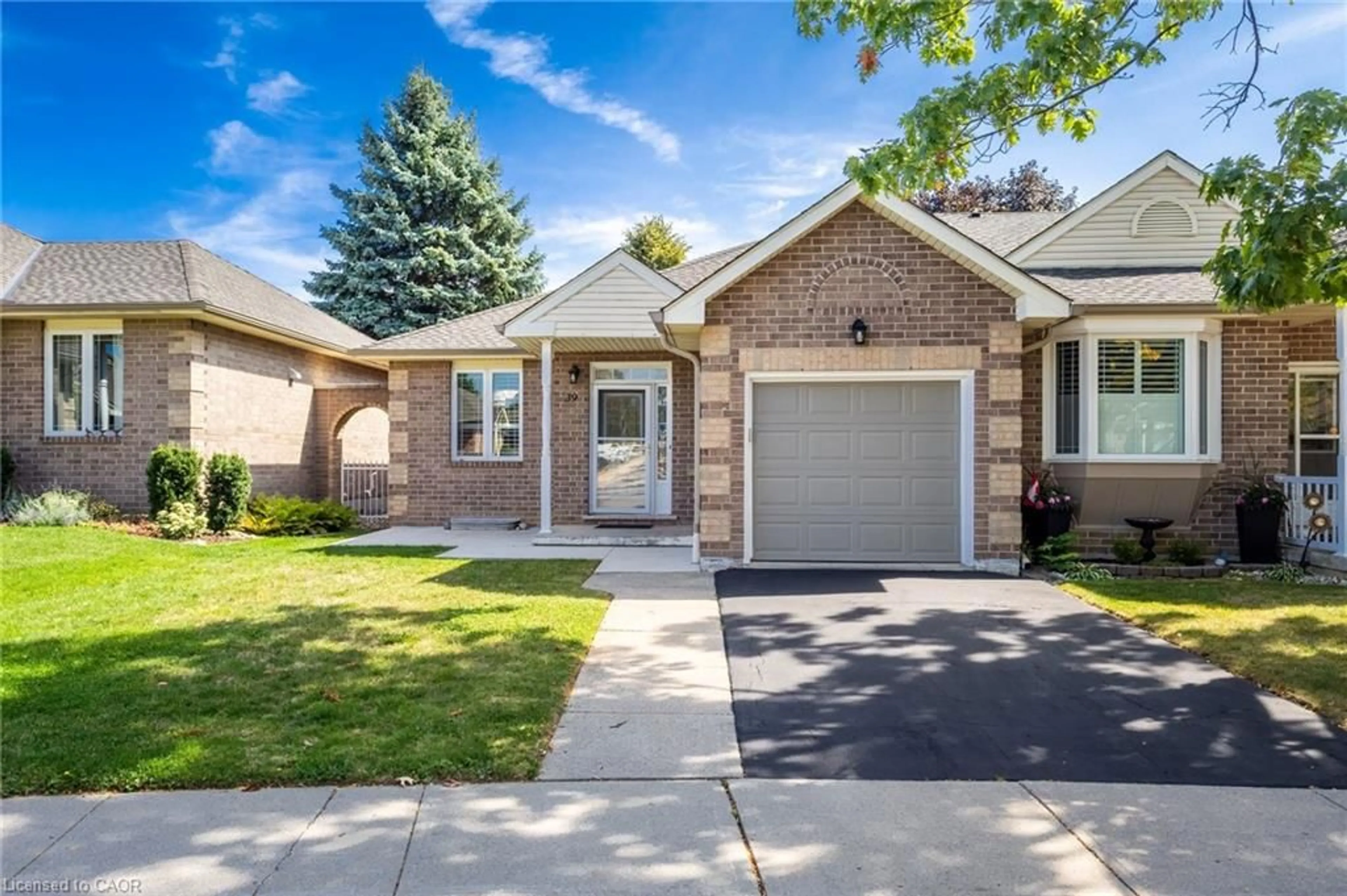 Home with brick exterior material, street for 39 Twentyplace Blvd, Hamilton Ontario L0R 1W0