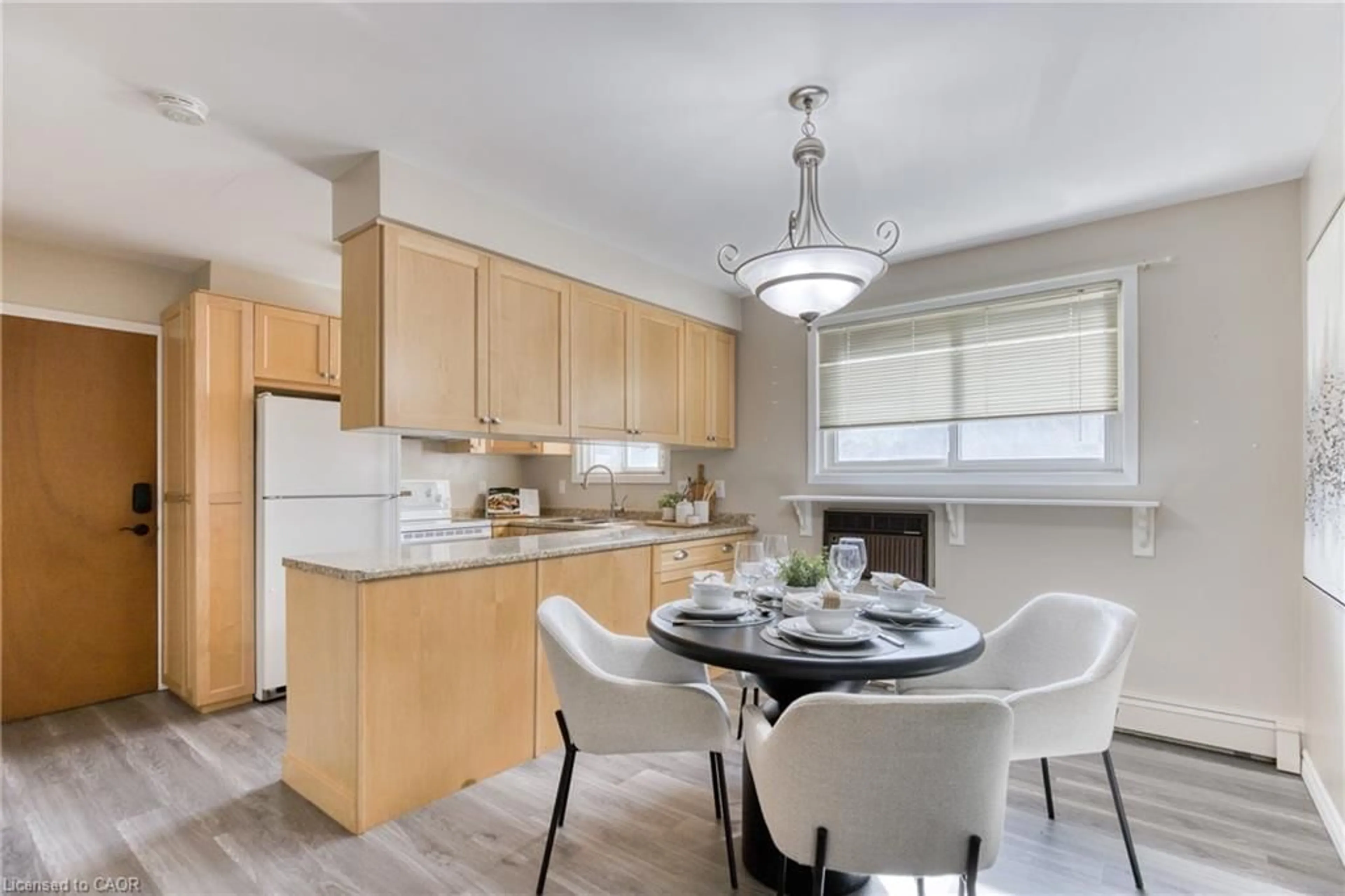 Open concept kitchen, wood/laminate floor for 80 Westwood Dr #Main, Kitchener Ontario N2M 2K4