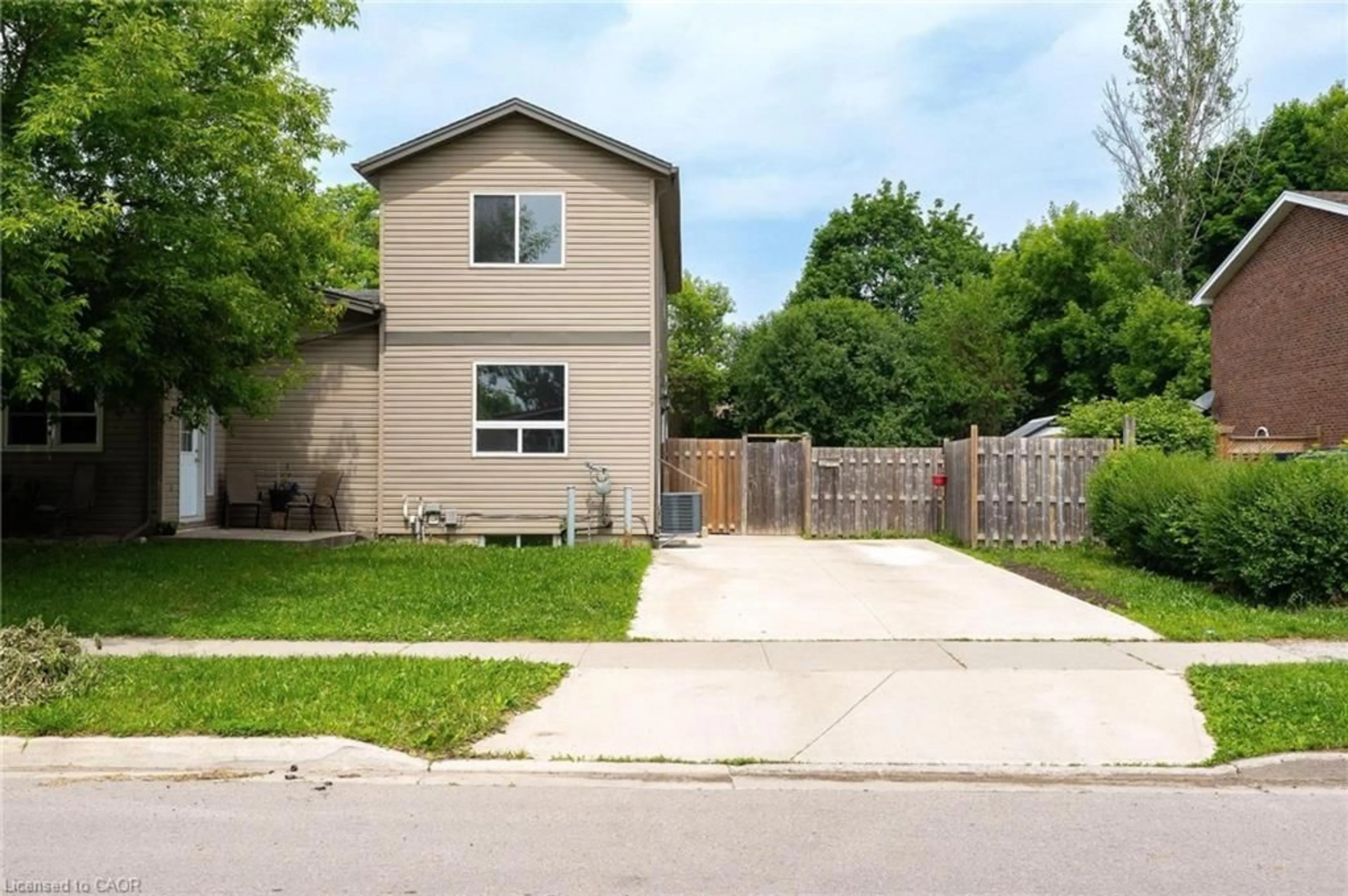 Home with vinyl exterior material, street for 120 Jansen Ave, Kitchener Ontario N2A 2L7