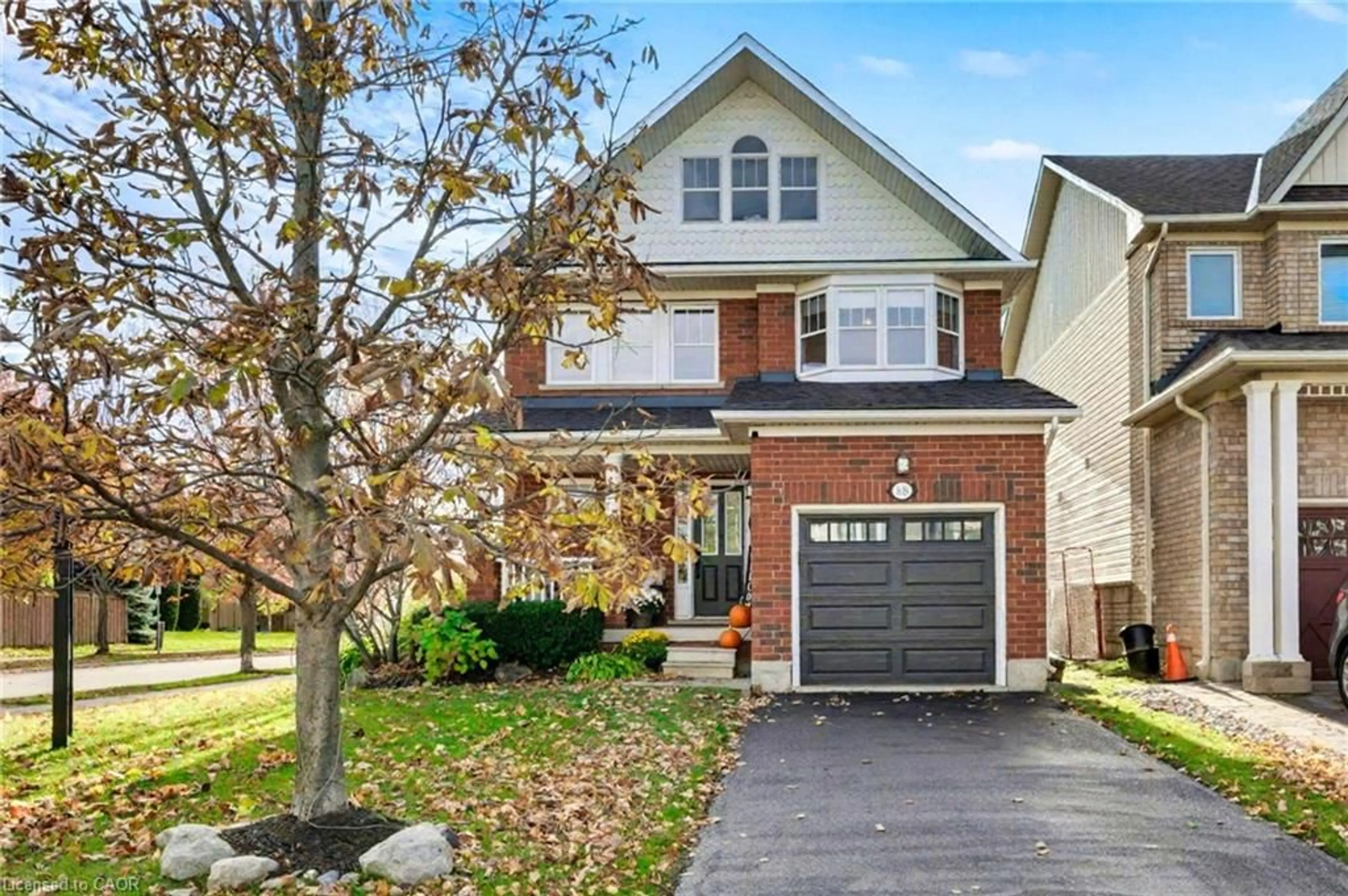 Home with brick exterior material, street for 88 Buttercup Cres, Waterdown Ontario L8B 0Y1