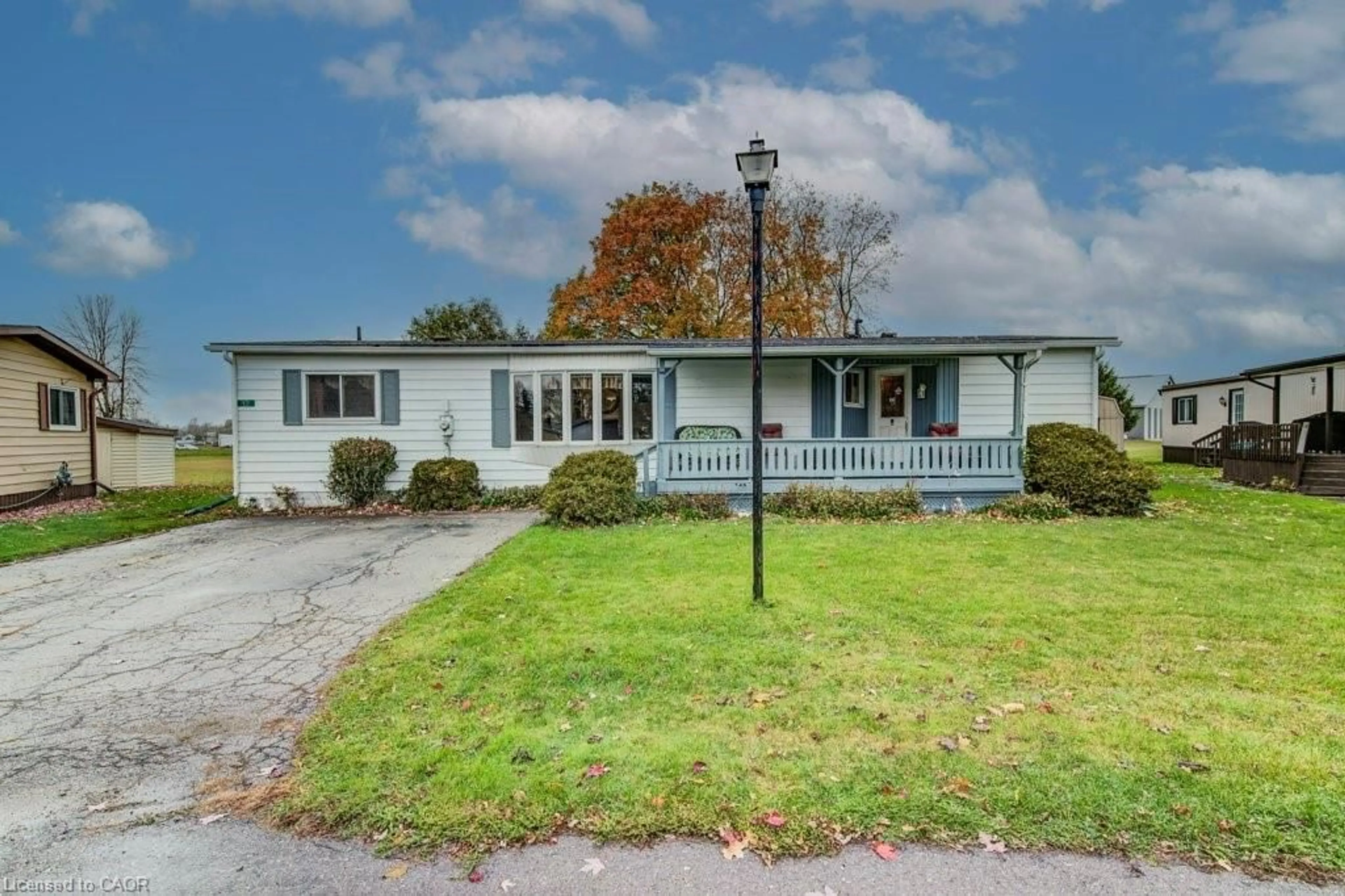 Home with vinyl exterior material, street for 12-5651 Perth Line 86, Listowel Ontario N4W 3G8