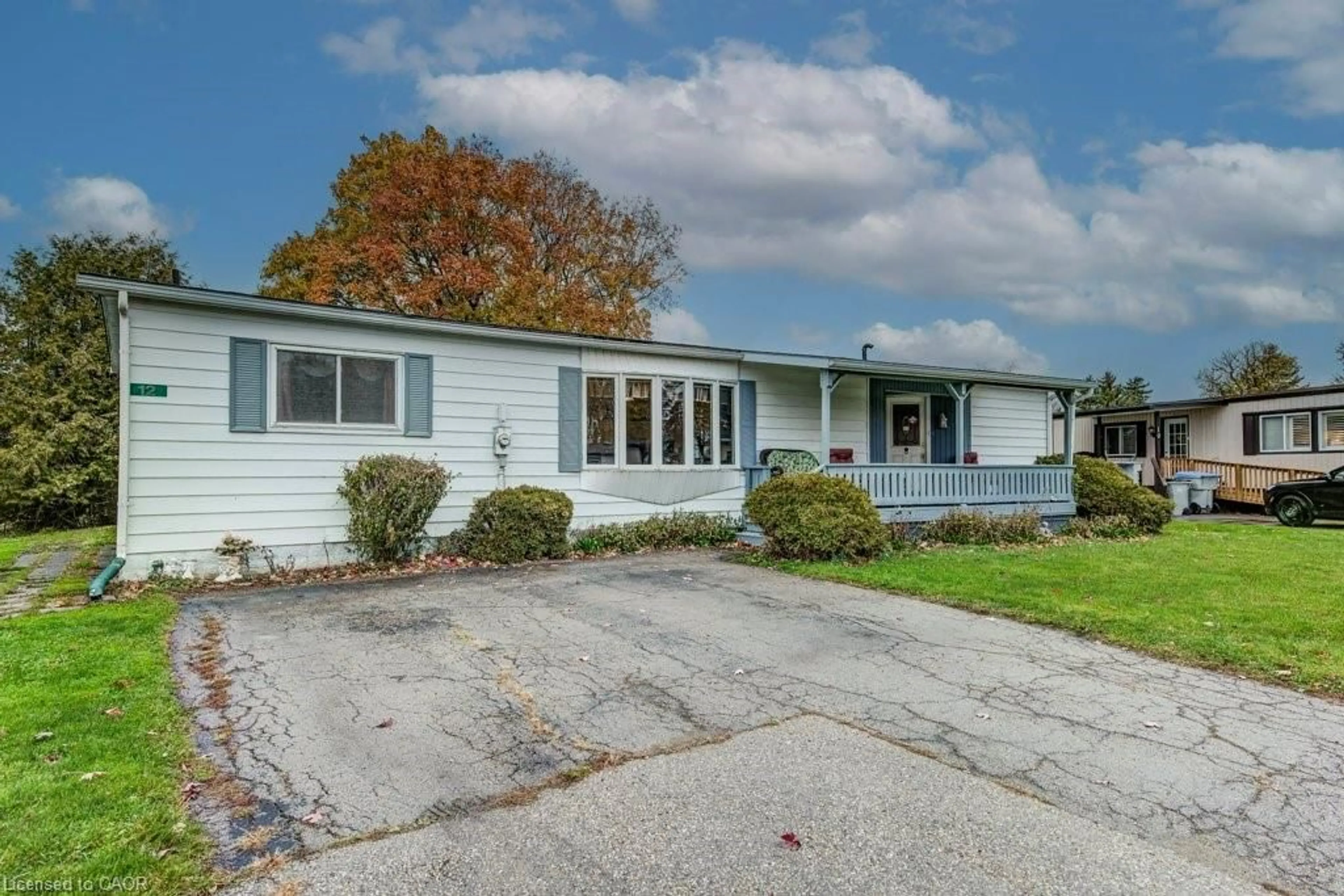 Home with vinyl exterior material, street for 12-5651 Perth Line 86, Listowel Ontario N4W 3G8