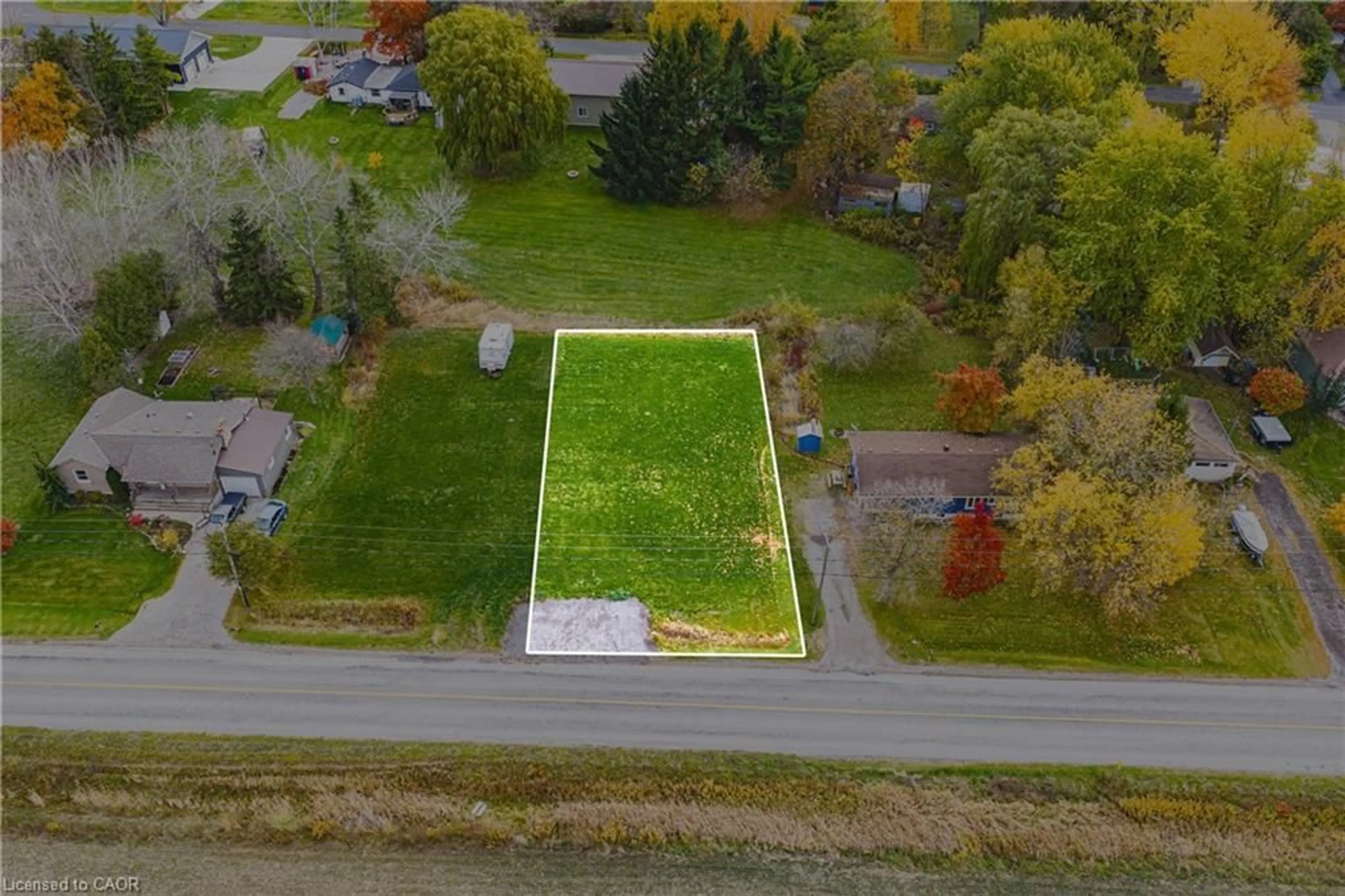 A pic from outside/outdoor area/front of a property/back of a property/a pic from drone, street for 610 New Lakeshore Rd, Port Dover Ontario N0A 1N3